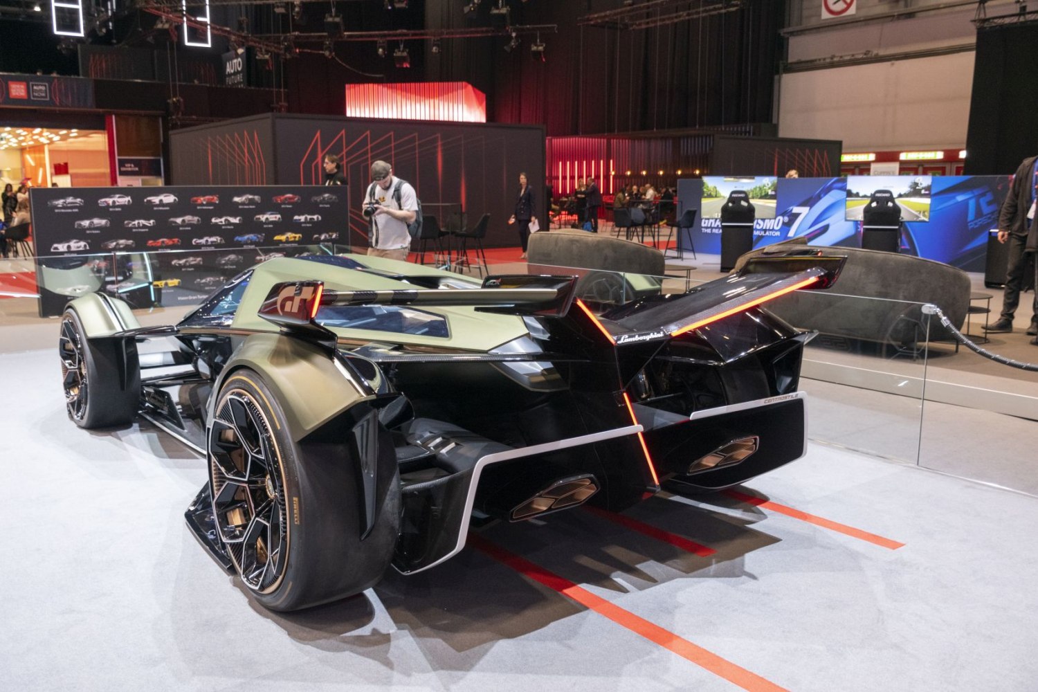 Futuristic aerodynamic rear with unique lighting and racing wheels.