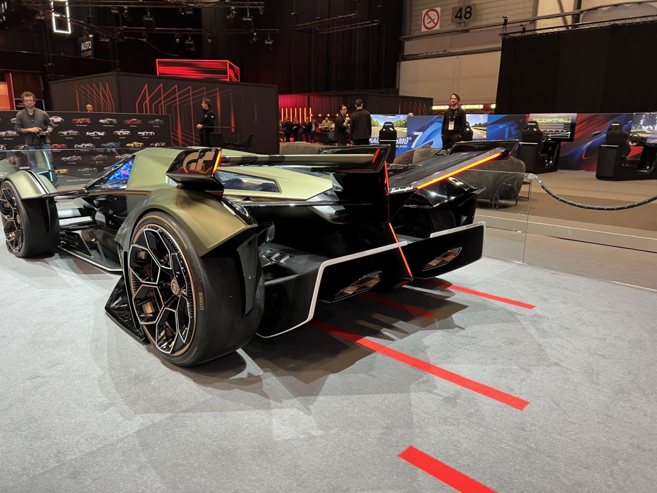 Futuristic rear wing and aerodynamic diffuser with detailed racing wheels