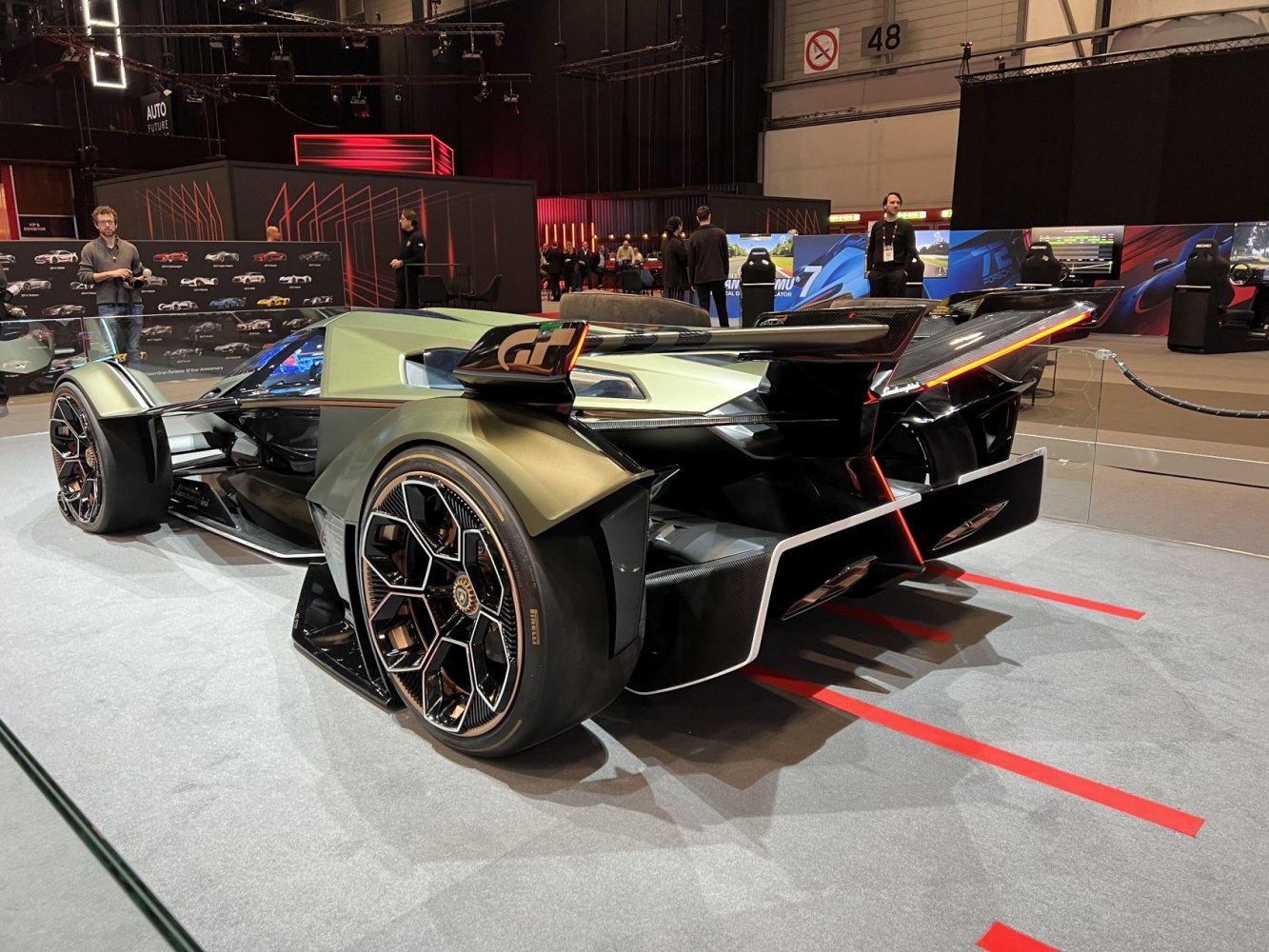 Futuristic rear design with large rear wing and hexagonal aero wheels