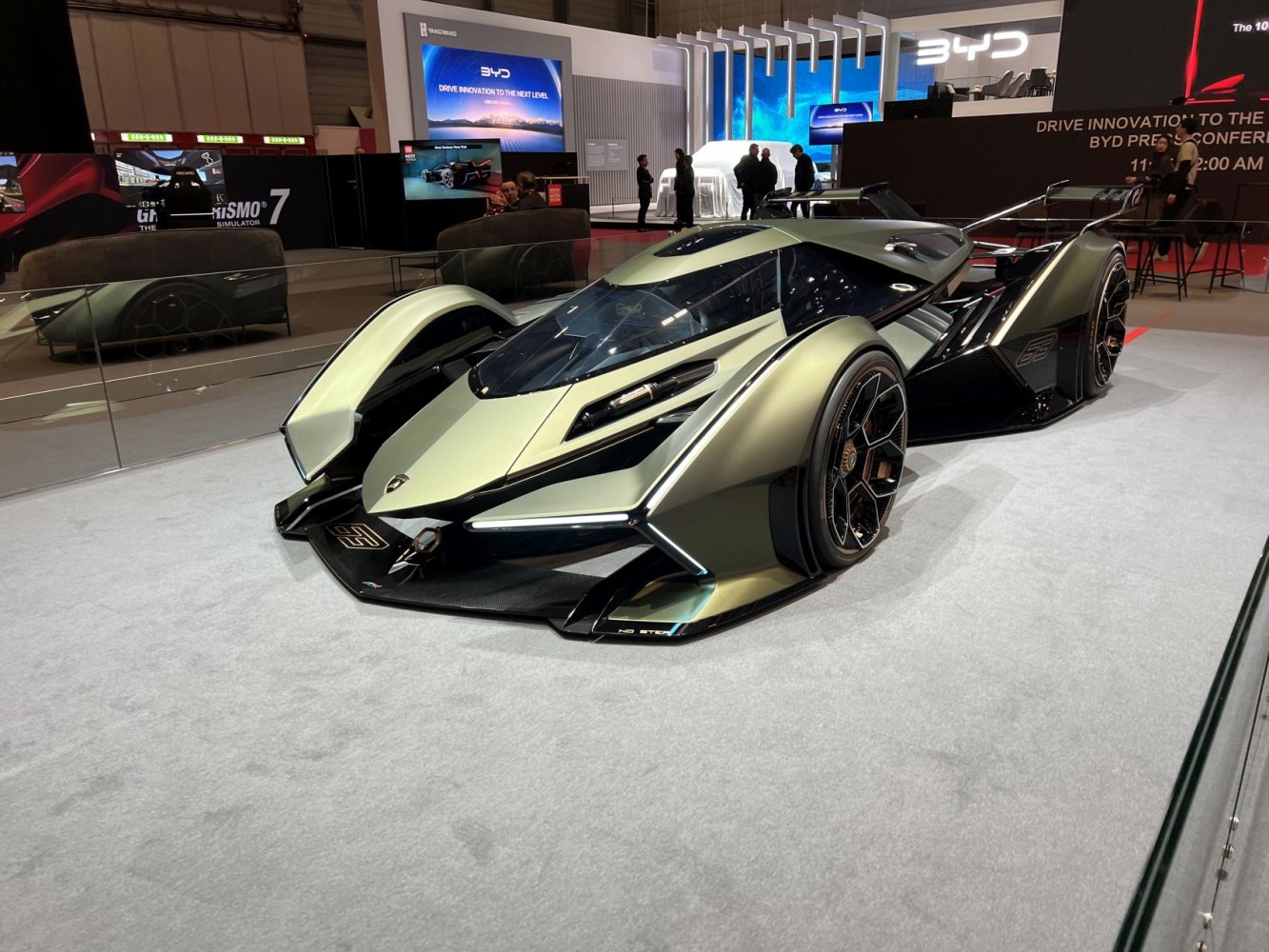Futuristic prototype with aerodynamic sculpted front fenders and sharp LED lights.