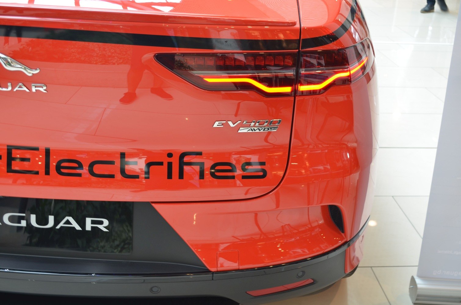 Jaguar I-Pace LED tail light and EV400 AWD badge on red rear panel