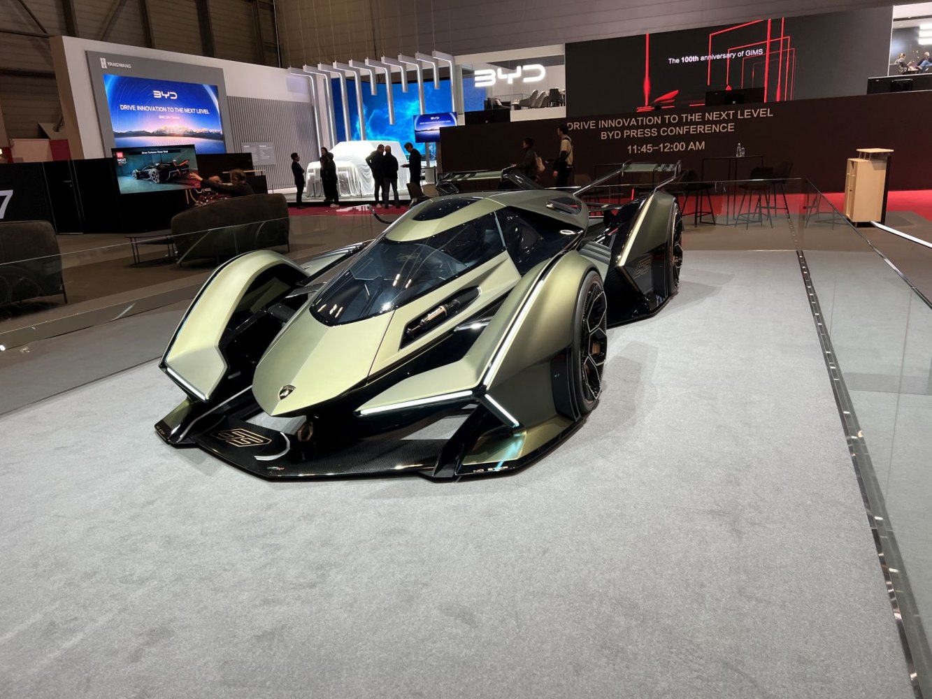 Aerodynamic futuristic race car with exposed wheels and aggressive design.