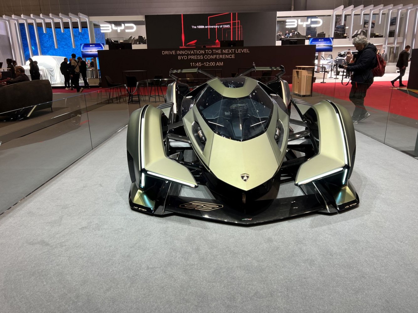 Front view of aggressive aerodynamic racing prototype with exposed suspension