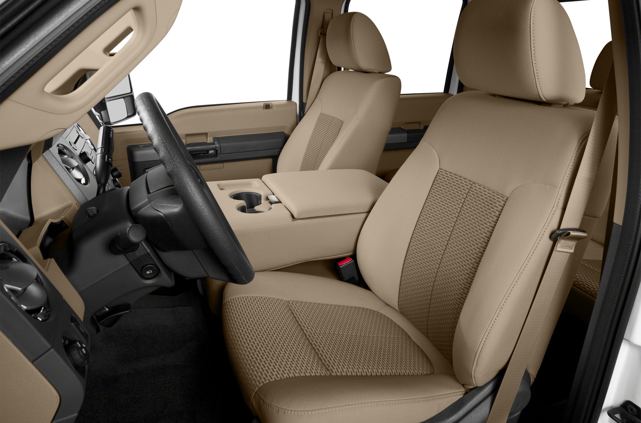 Beige fabric front seats and center console with cup holders.