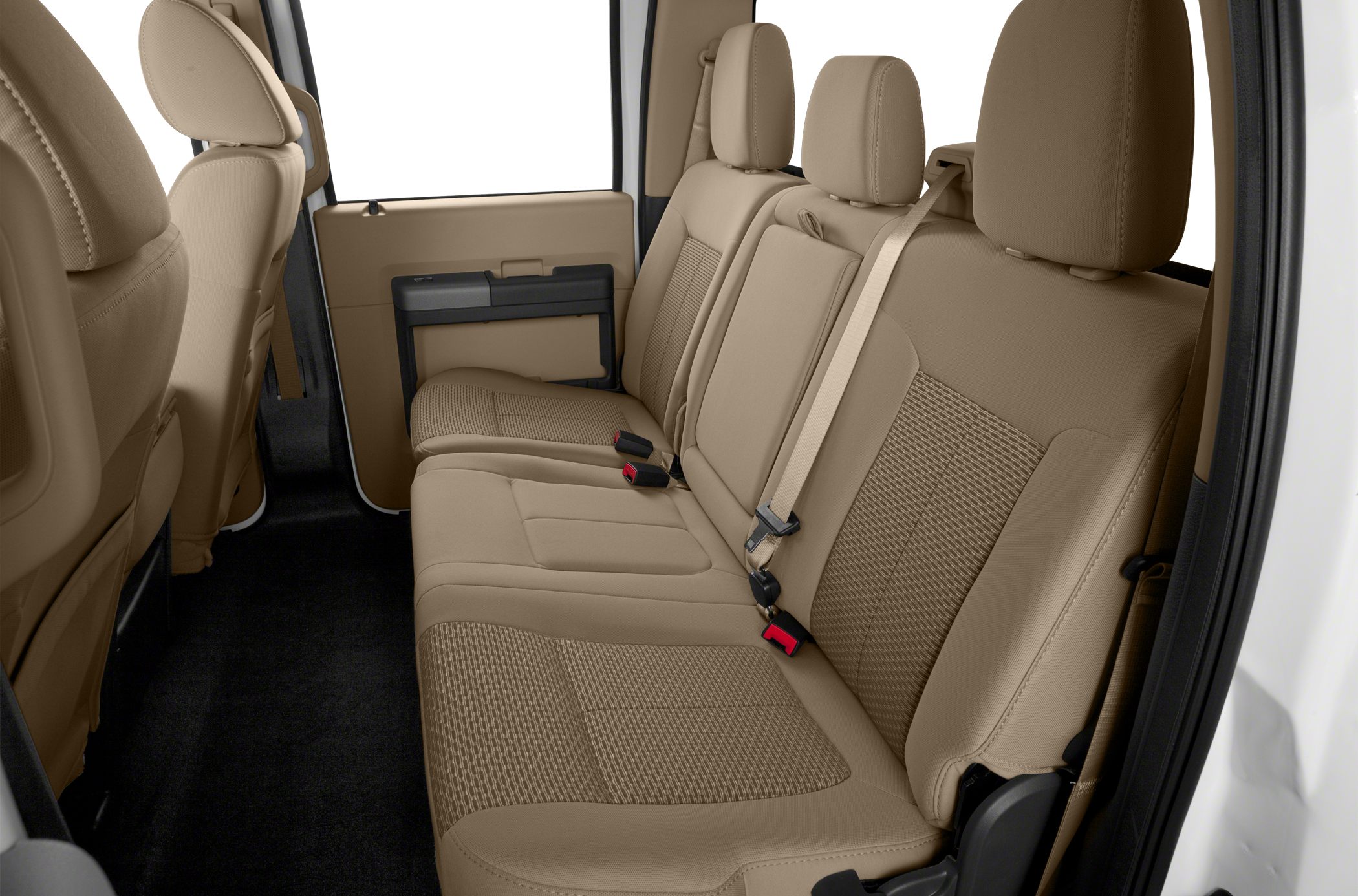 Beige rear bench seats with integrated headrests and seatbelts