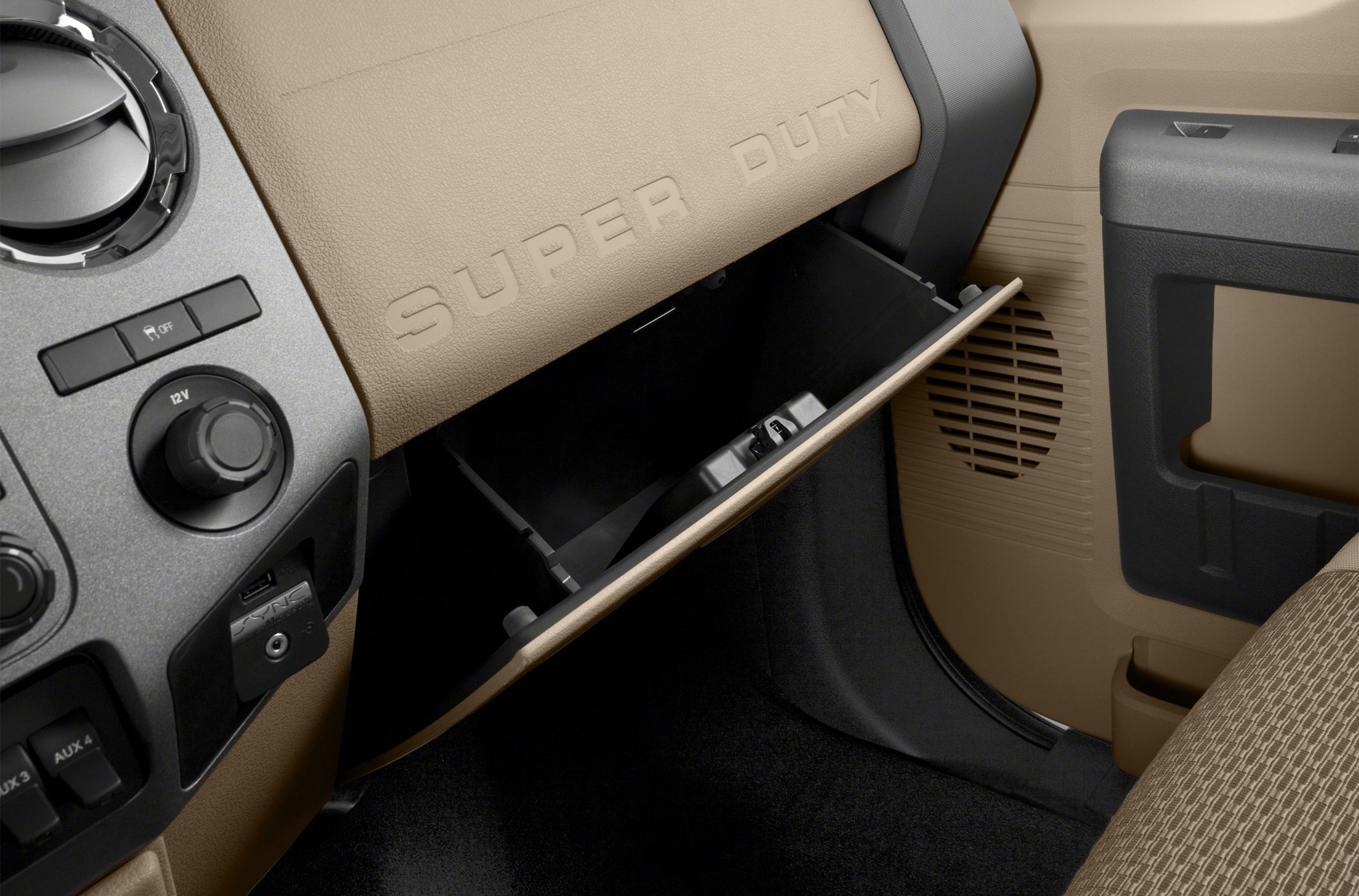 Open glovebox and dashboard controls with Super Duty embossing