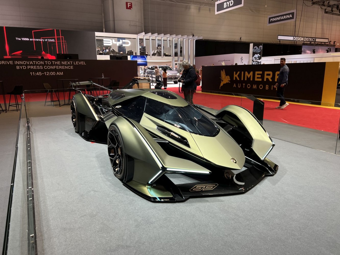 Futuristic race car prototype with aggressive aerodynamic body and wide wheels