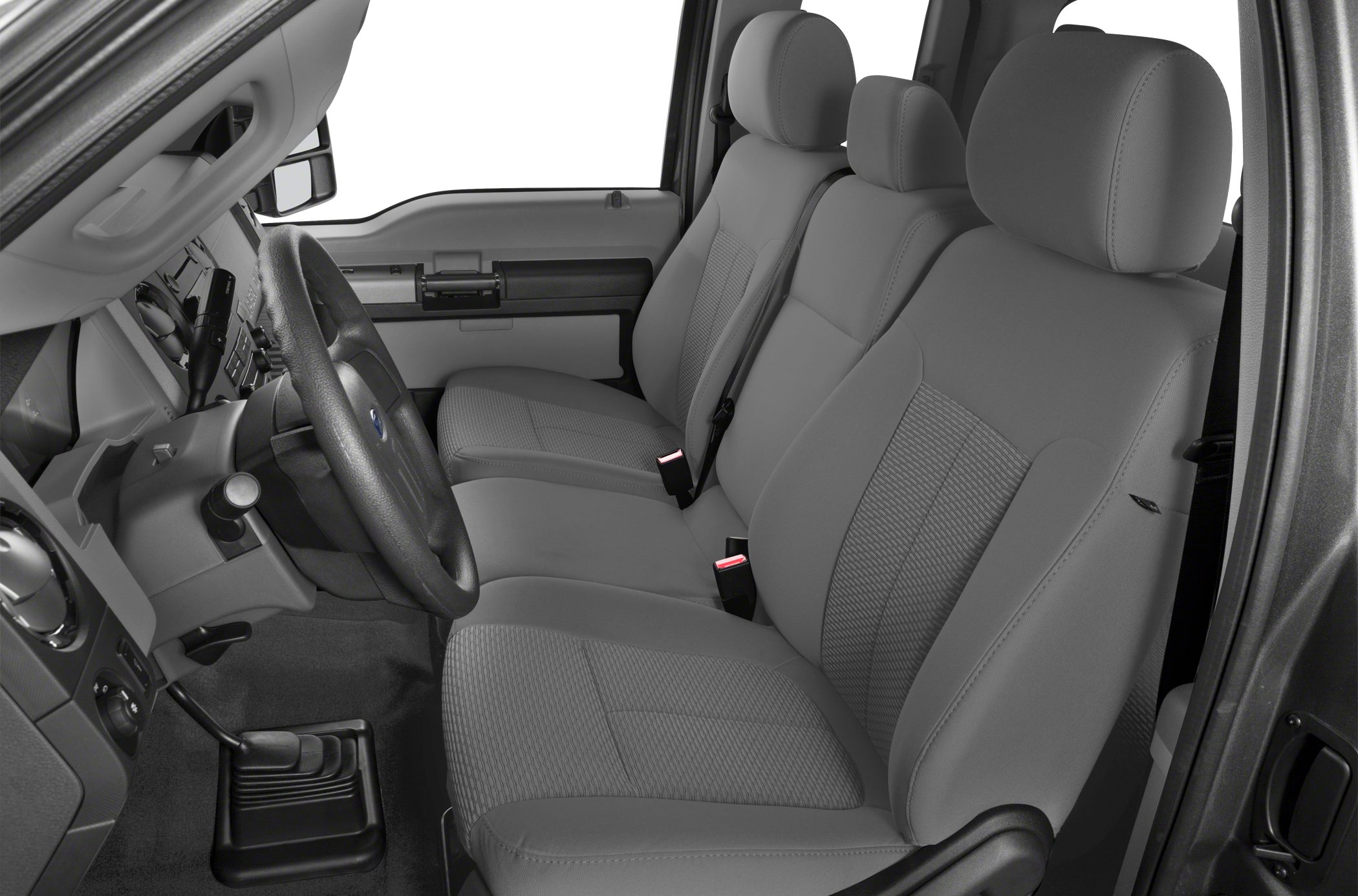 Durable cloth seats and functional dashboard with manual shifter