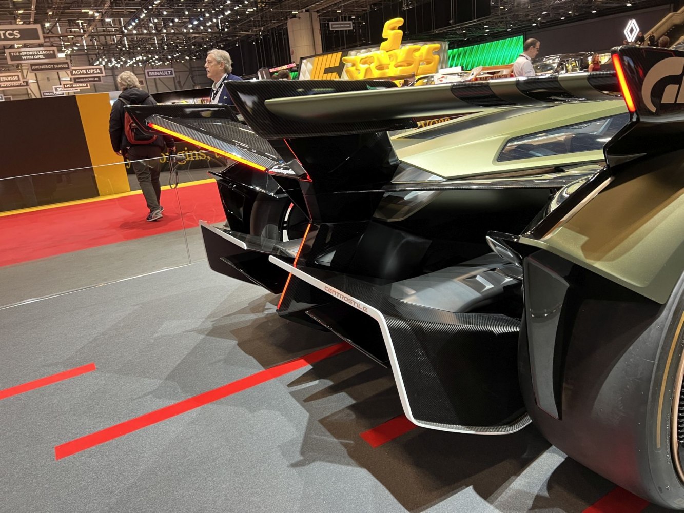 Rear aerodynamic wing and diffuser with carbon fiber details