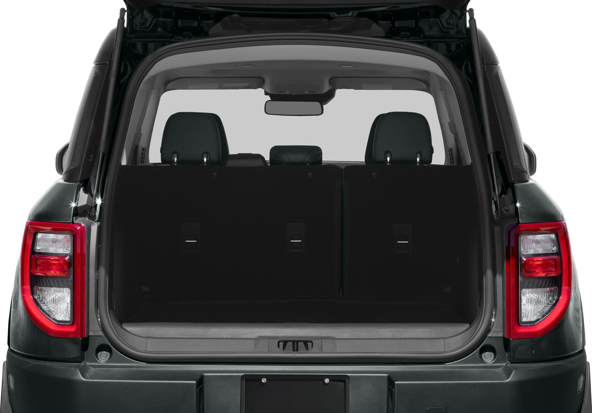Open rear trunk space and rear seat headrests
