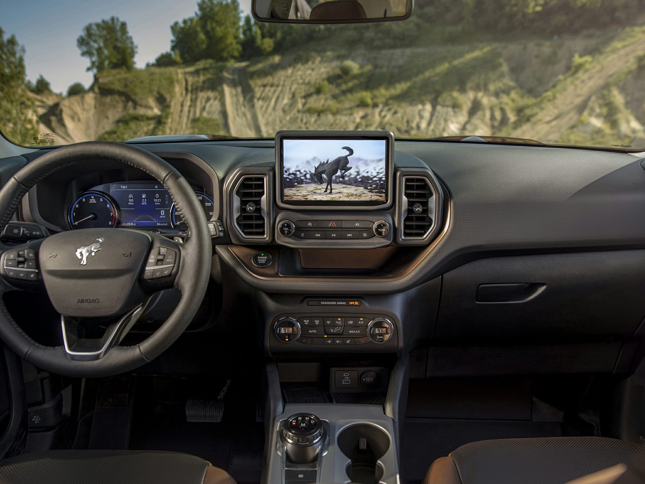 Digital dashboard, touchscreen infotainment, climate control panel