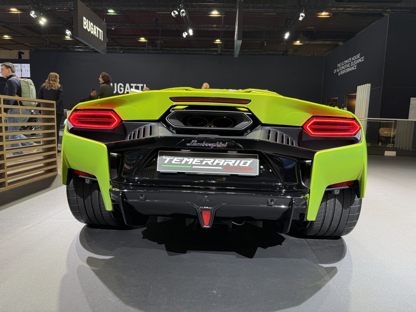 Rear view with distinct LED taillights and central exhaust
