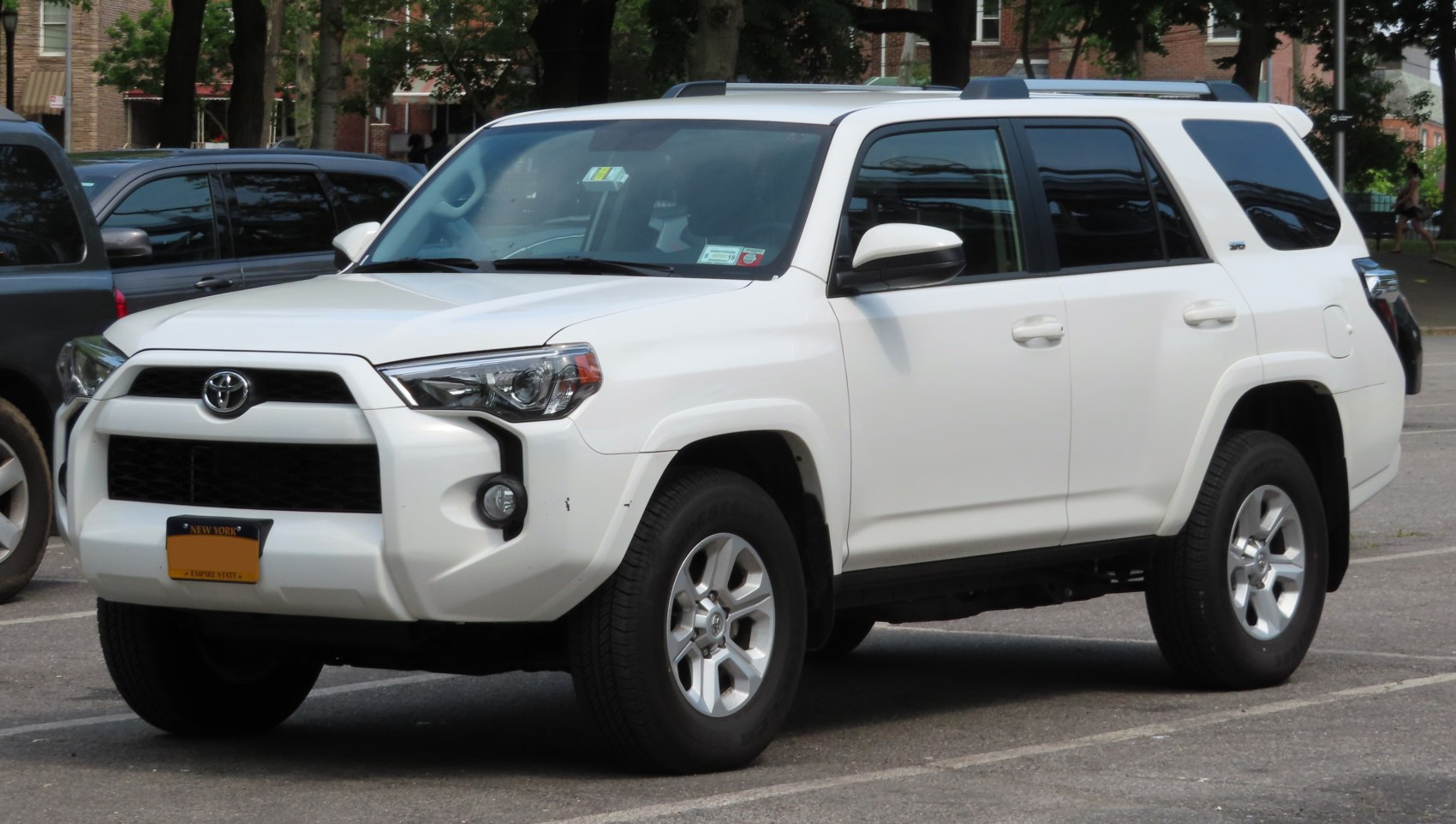 White SUV front and side profile with modern headlights and rugged design