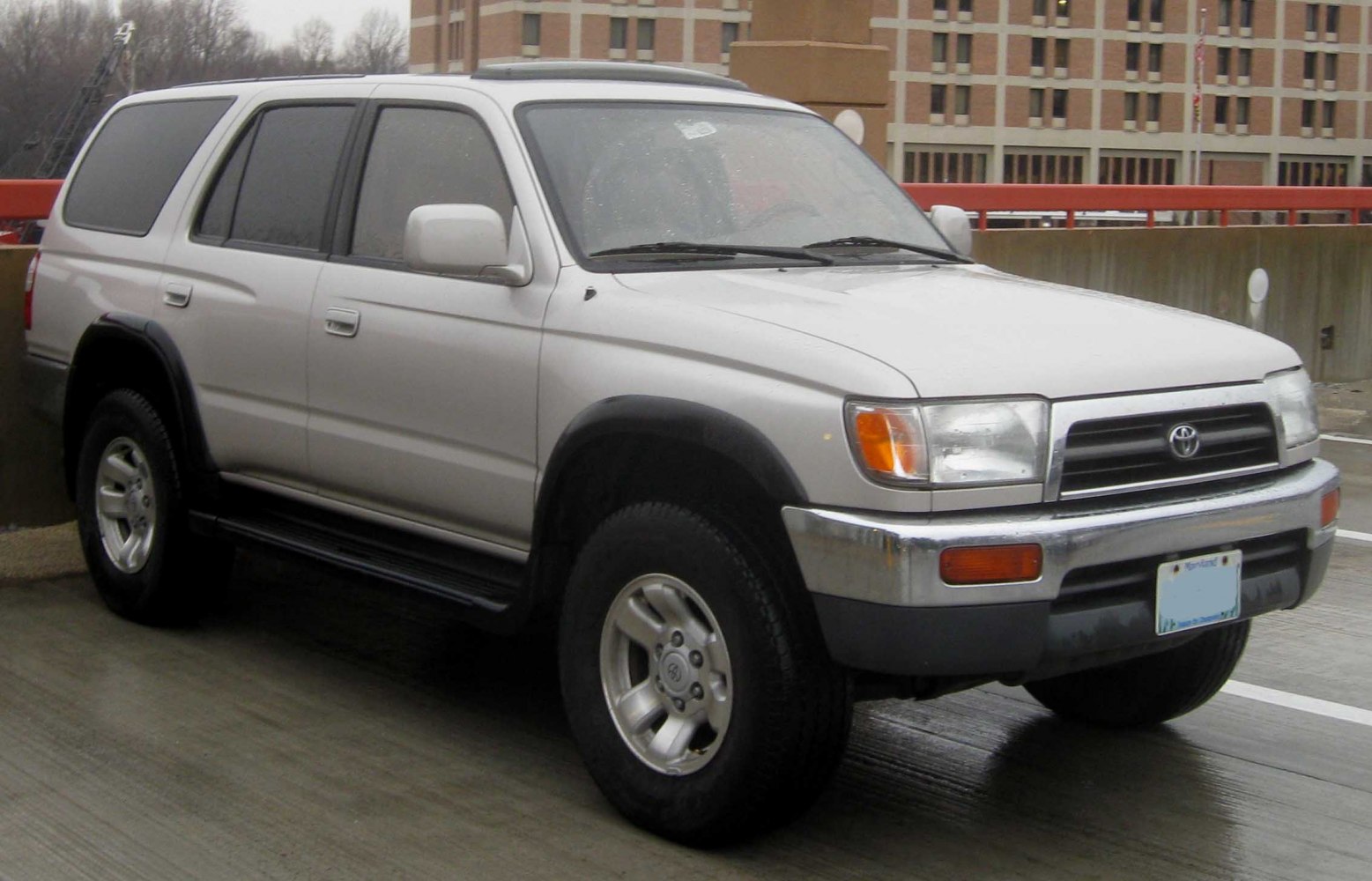 Rugged SUV with large tires and distinctive front grille