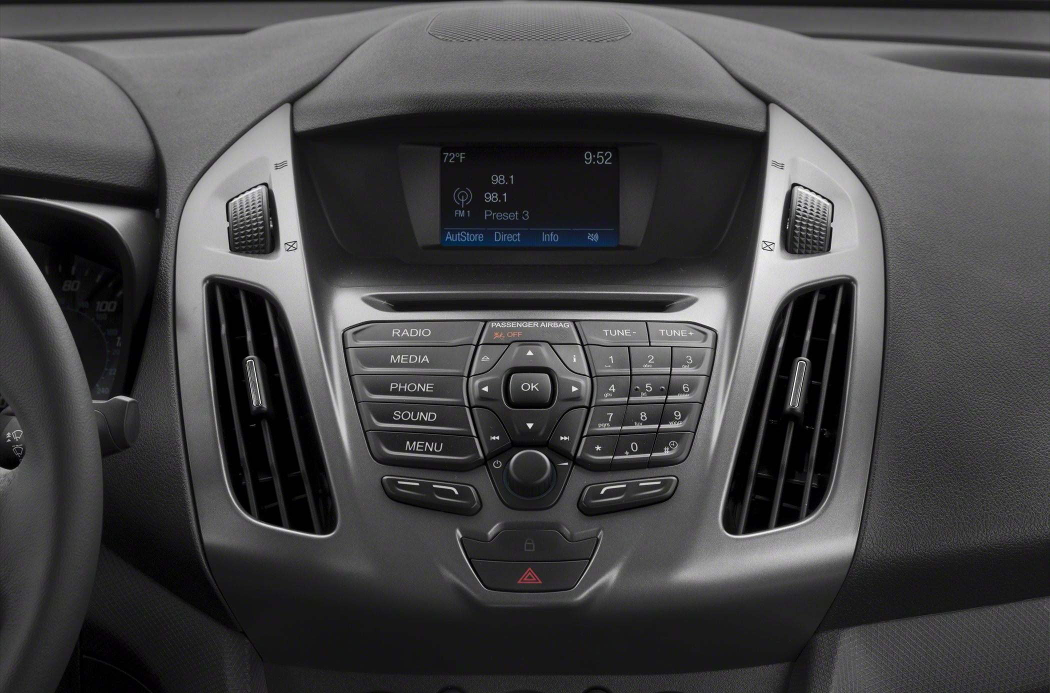 Car dashboard with radio, control buttons, and display screen