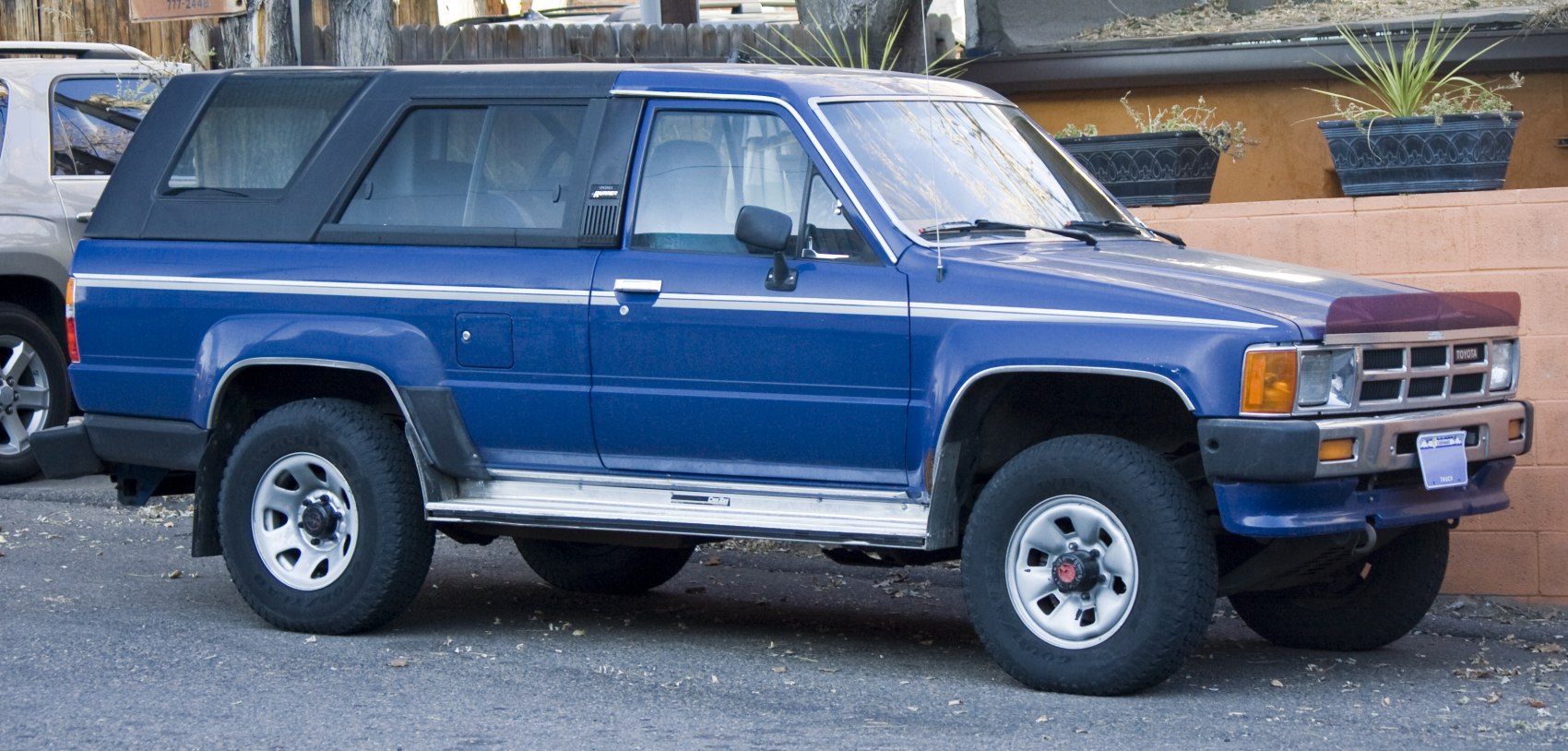 Classic two-door SUV with hardtop rear and off-road tires