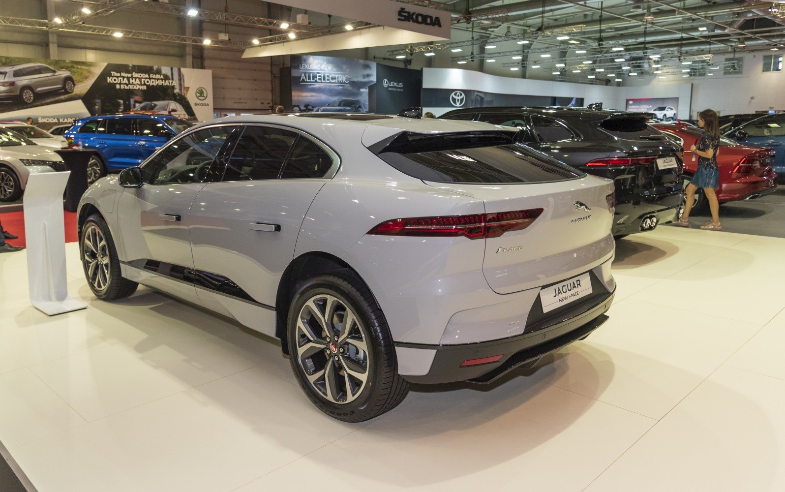 Rear three-quarter view with distinct tail lights and sleek aerodynamic design