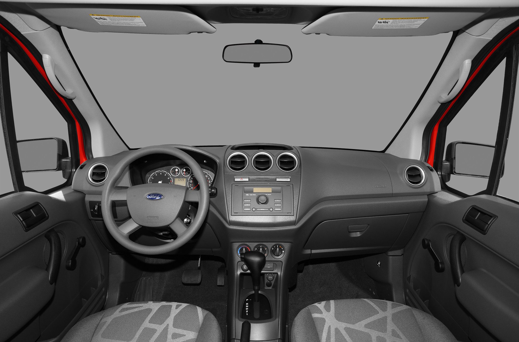 Dashboard and front cabin interior with steering wheel and gear shift