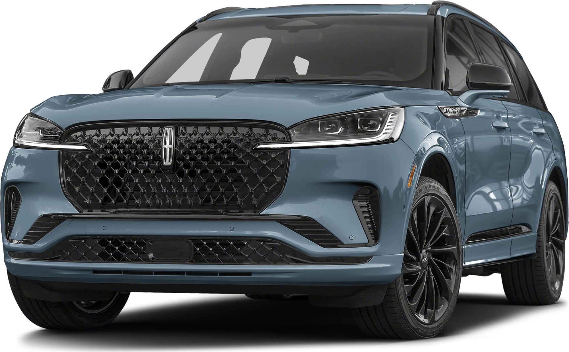 Front view with black patterned grille and LED headlights