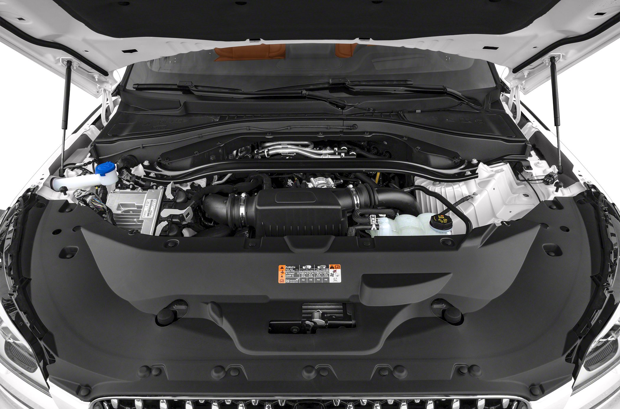 Engine compartment with visible air intake and fluid reservoirs