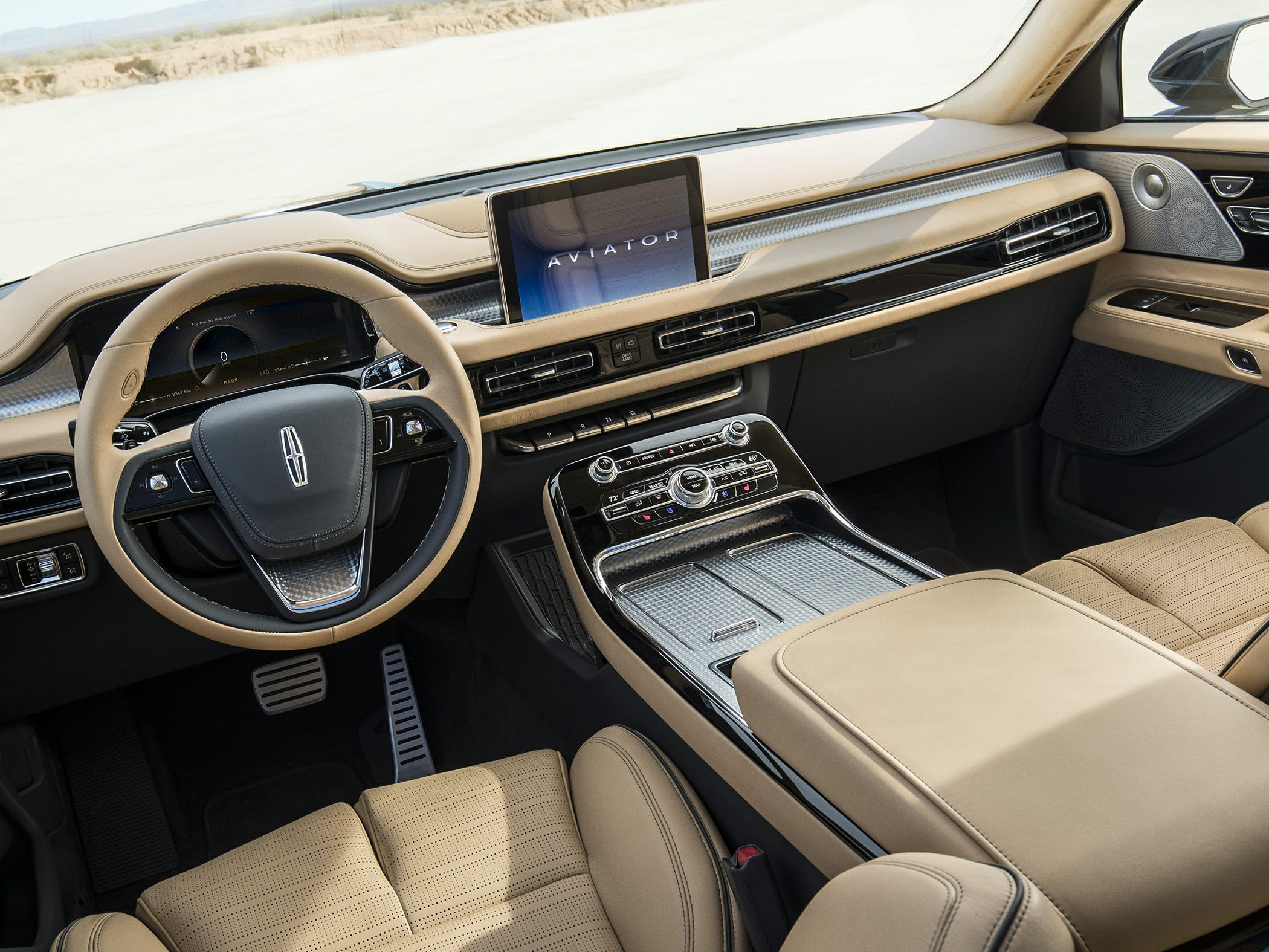 Tan leather interior with digital instrument cluster and infotainment screen