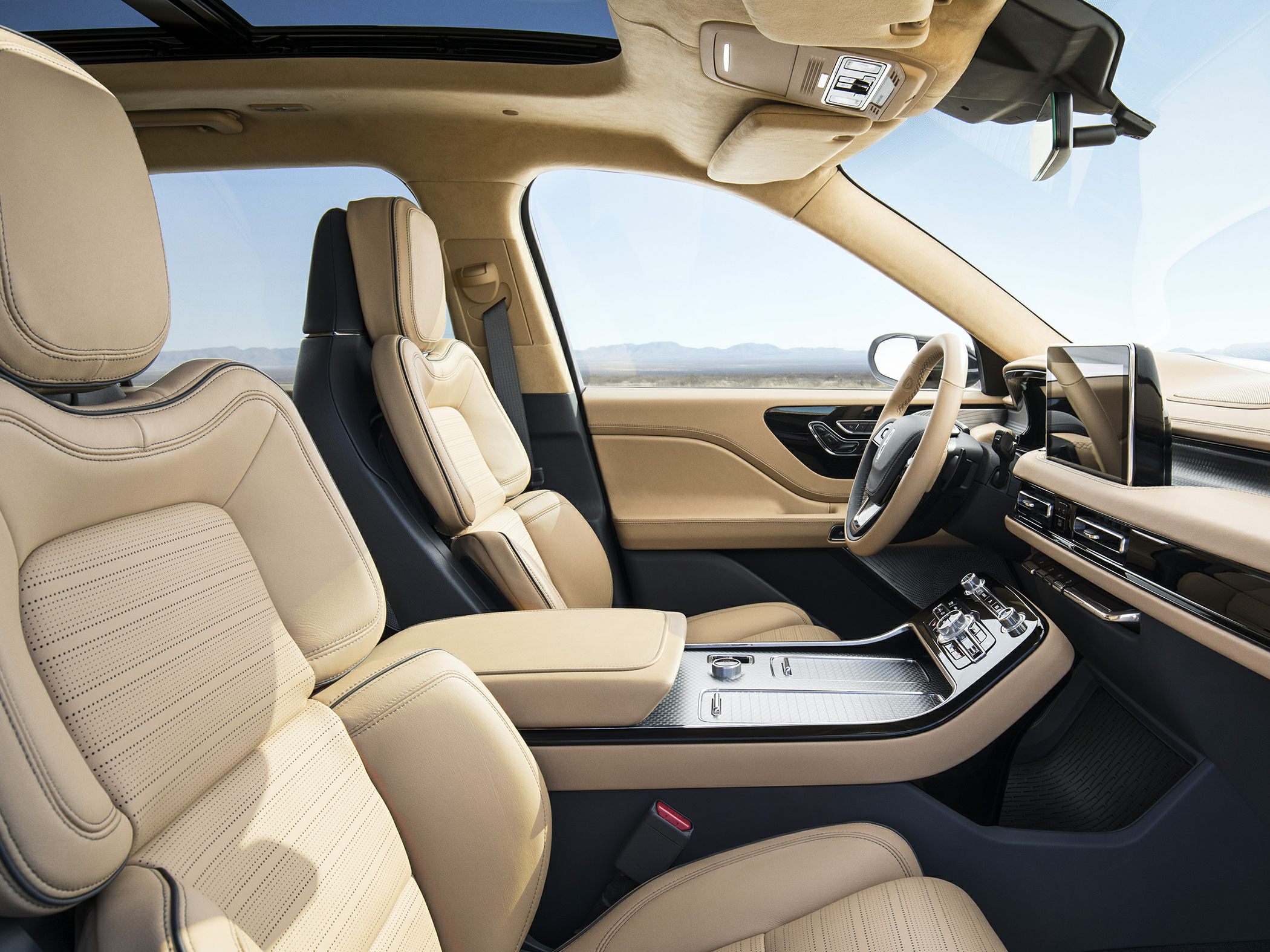 Premium beige leather seats and panoramic sunroof in luxury SUV interior