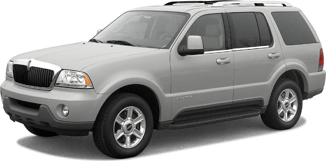 Front side view of SUV with bold grille and chrome alloy wheels