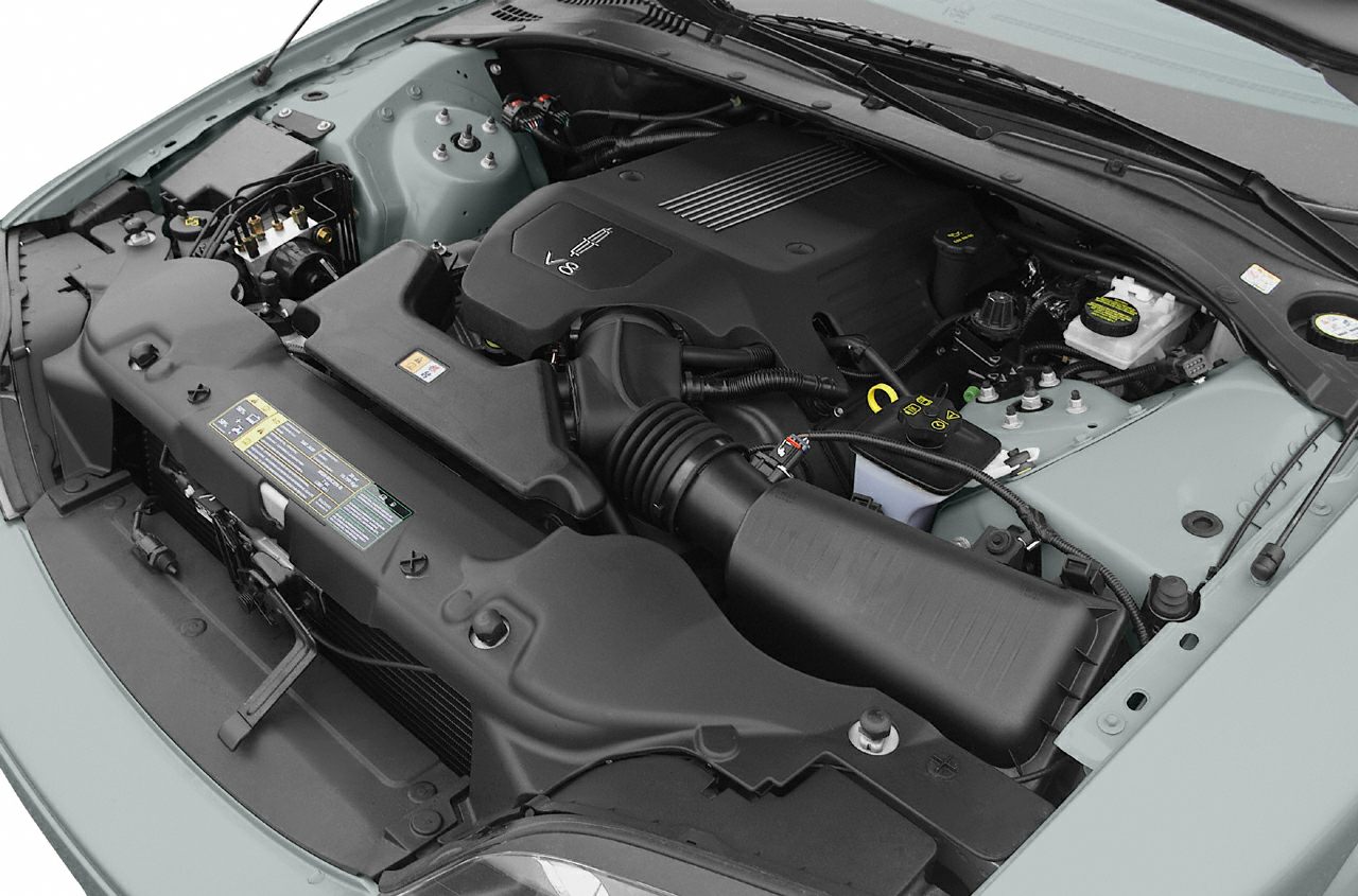 V8 engine bay with air intake system and engine cover