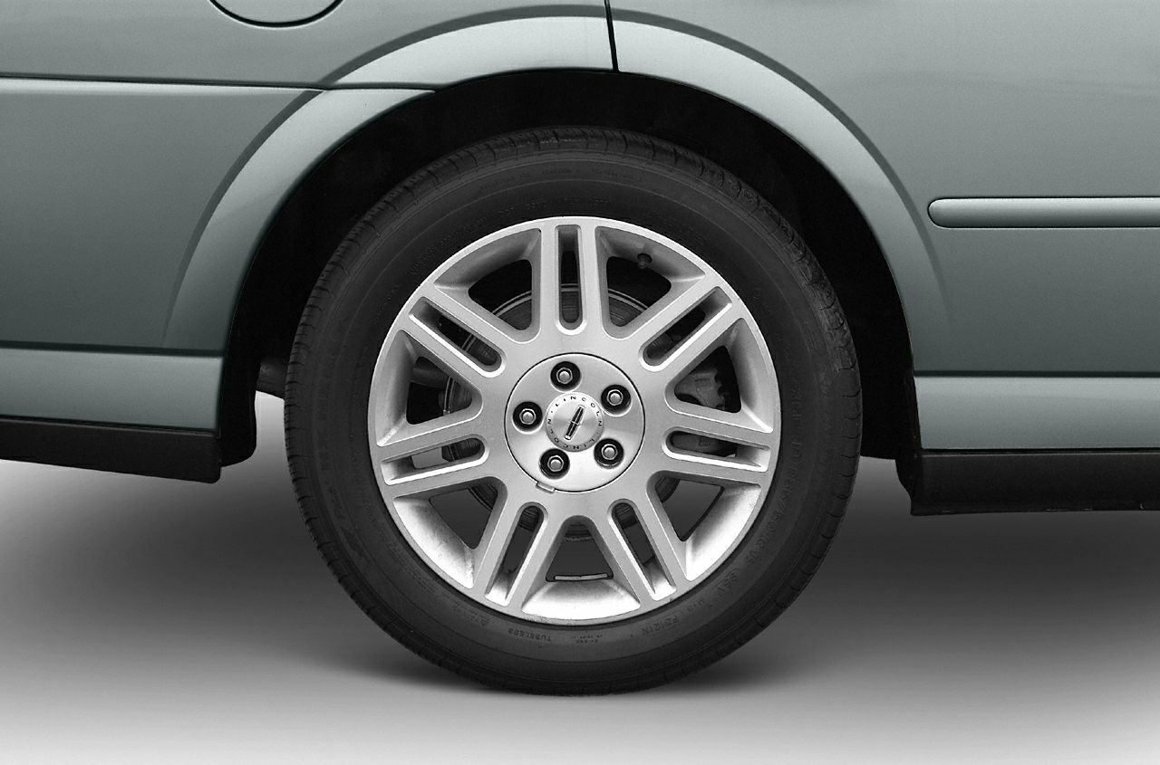 Close-up of a multi-spoke alloy wheel with branded center cap