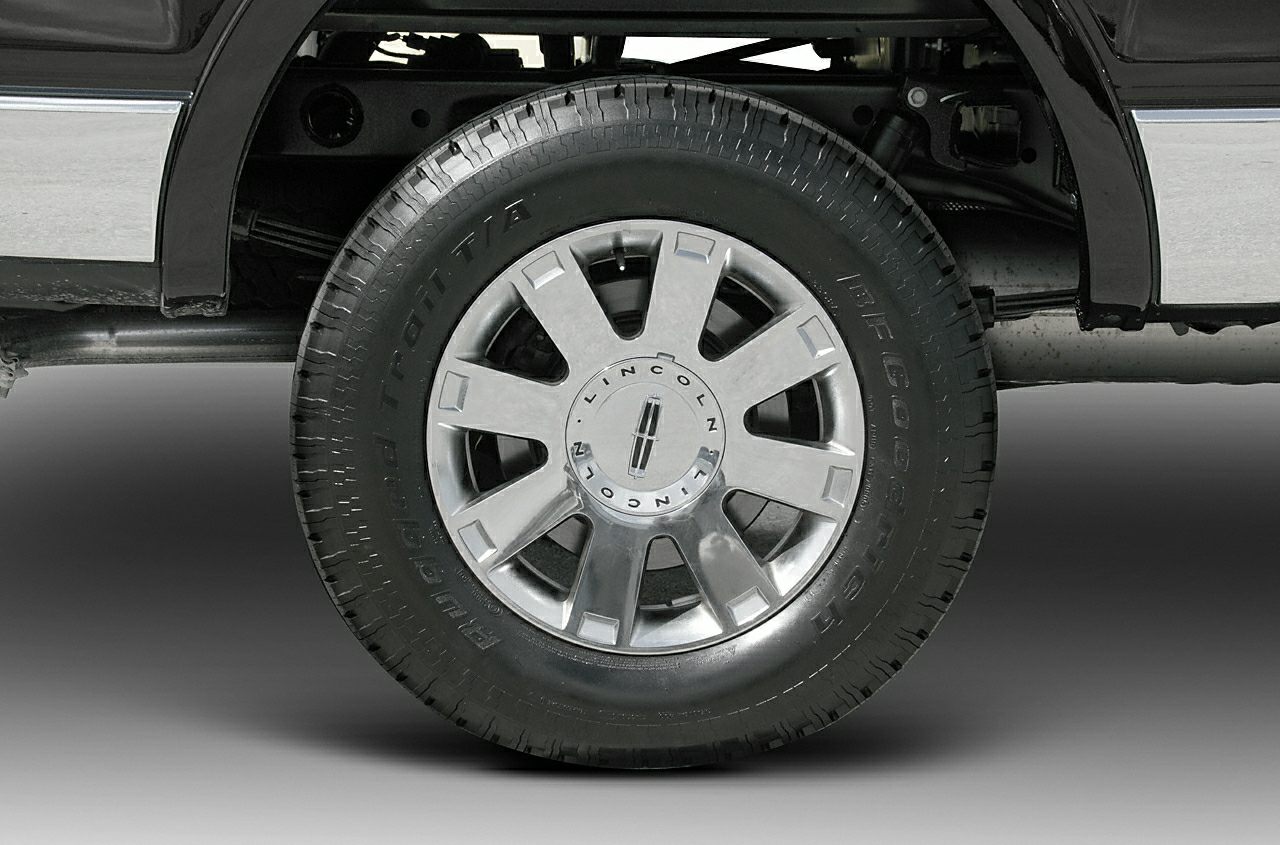 Close-up of a wheel with distinctive alloy rim and BF Goodrich tire.