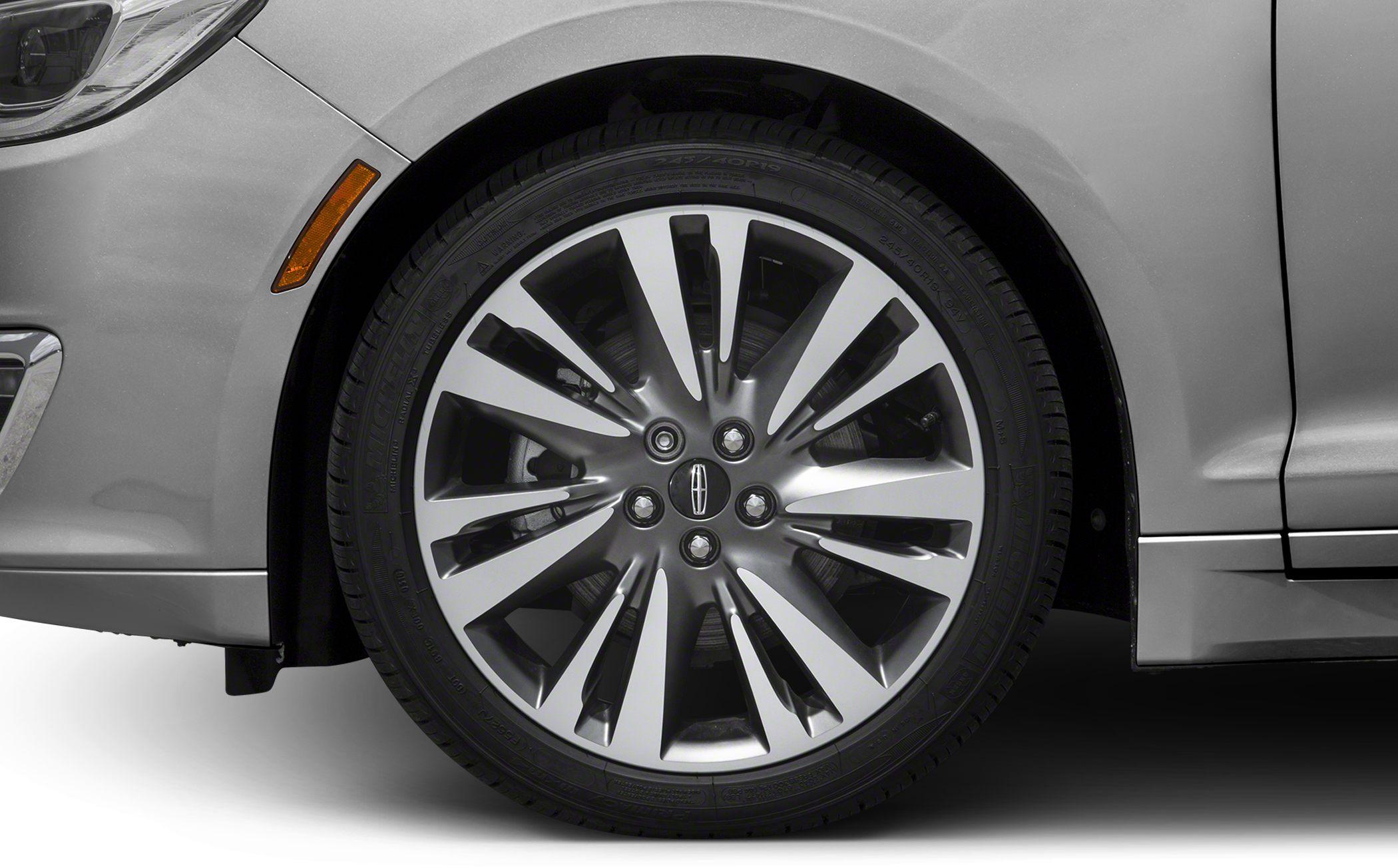 Stylish alloy wheel and front fender close-up.
