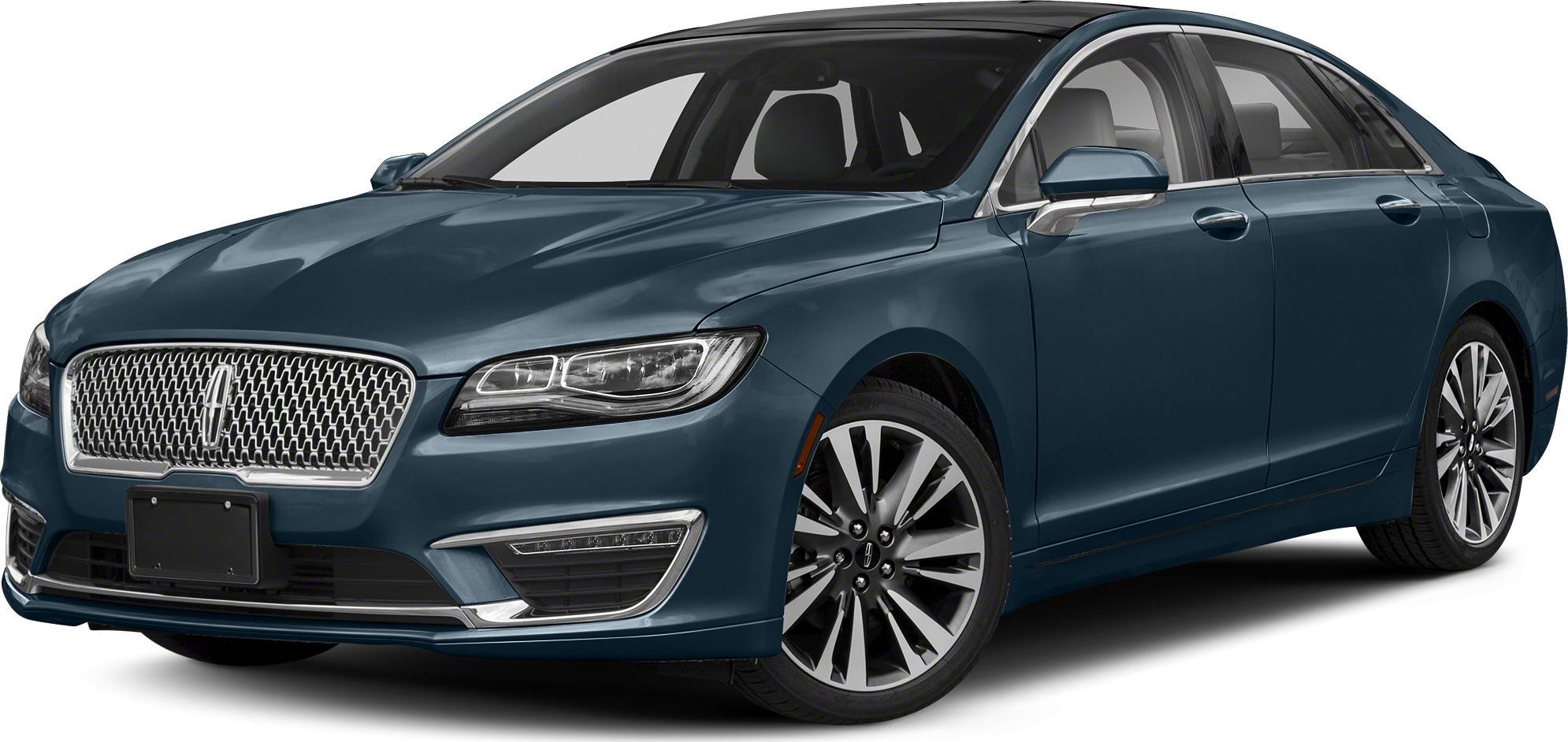 Front-side view of luxury sedan with distinctive grille and LED headlights