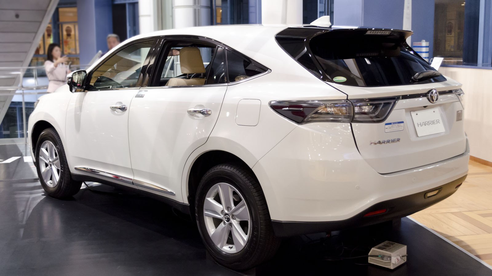 Rear side view with tail lights and alloy wheels