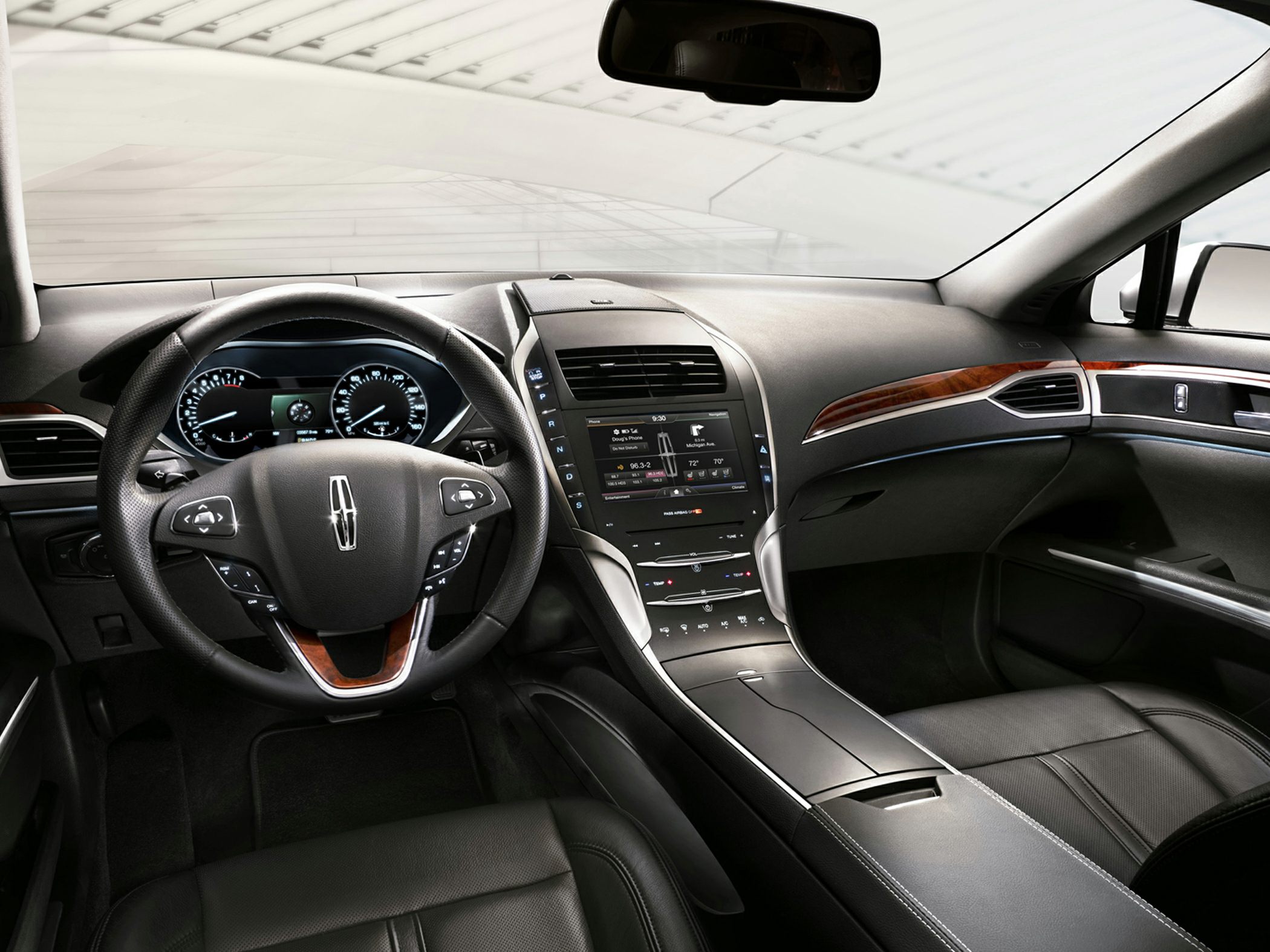 Modern dashboard and premium steering wheel in car interior