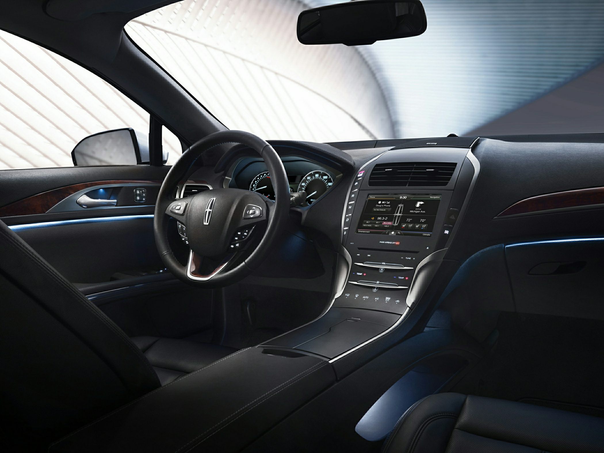 Luxury interior with dashboard touchscreen and multifunction steering wheel