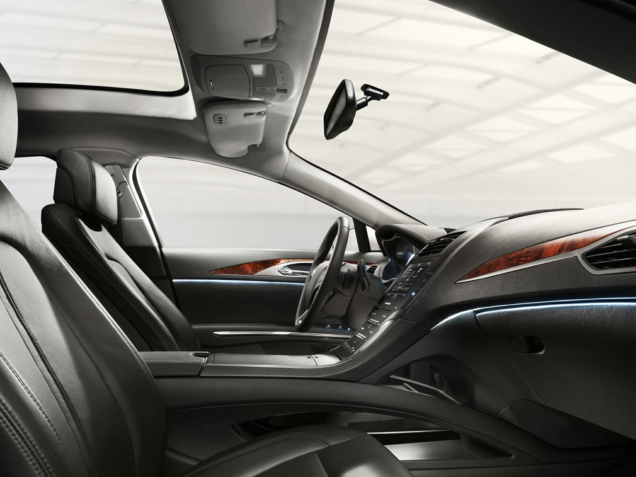 Luxury leather seats and detailed dashboard with ambient lighting