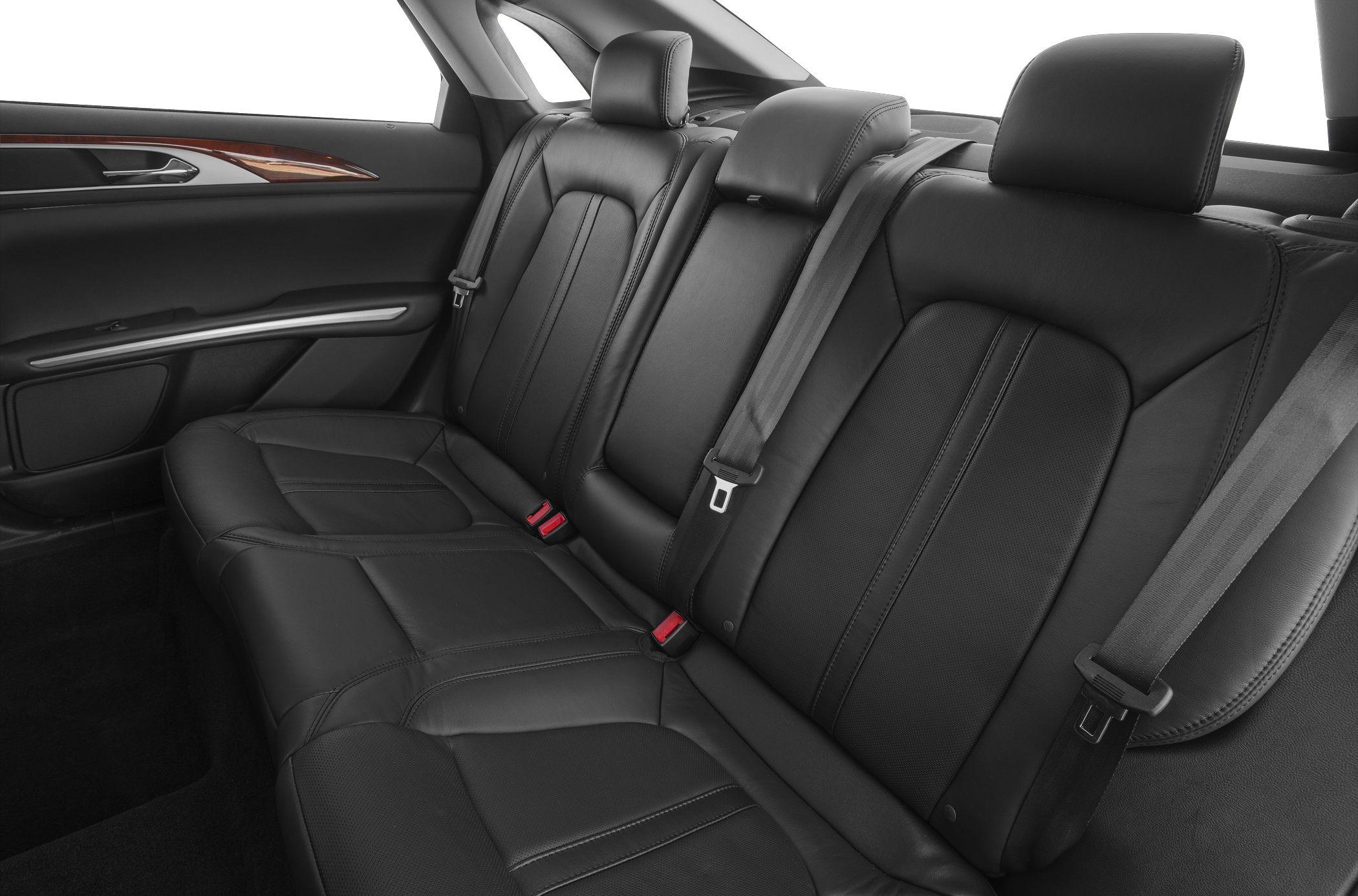 Rear black leather seats with headrests and seatbelts