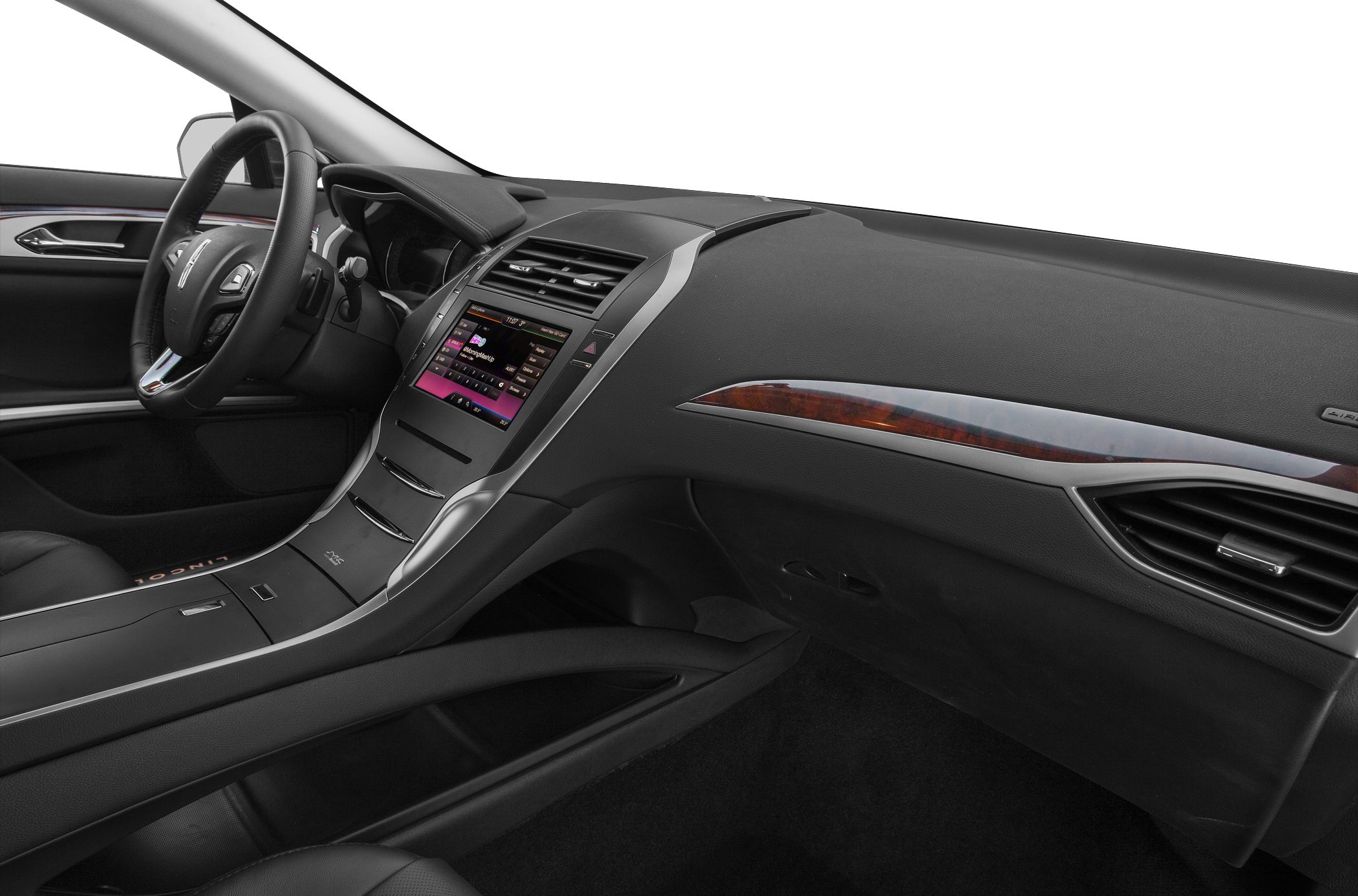 Touchscreen infotainment and wood trim dashboard interior.