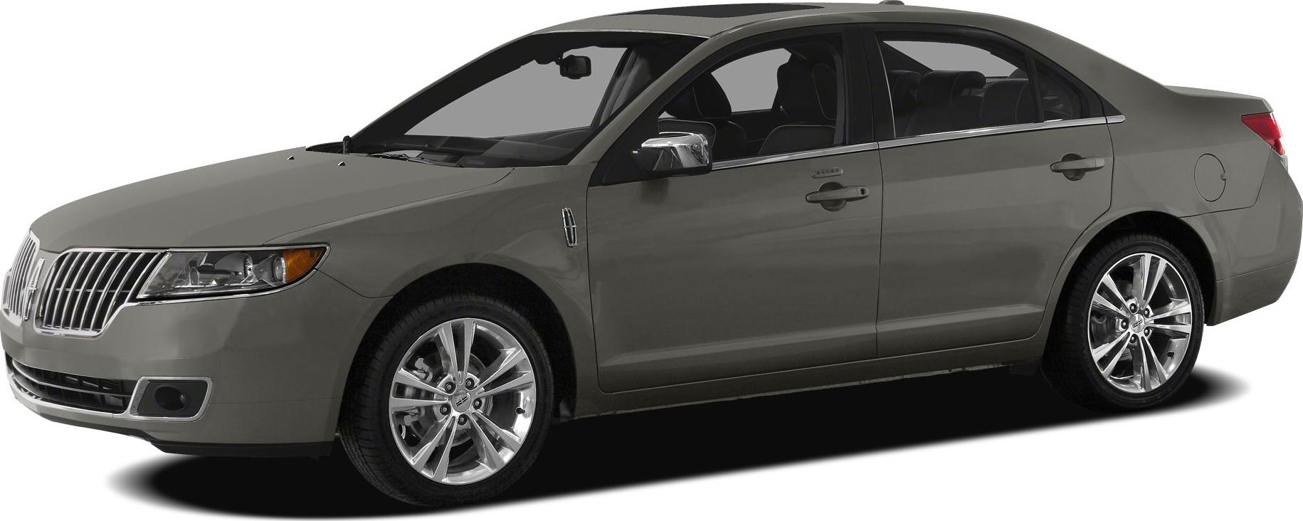 Front side view of a luxury sedan with chrome grille and alloy wheels