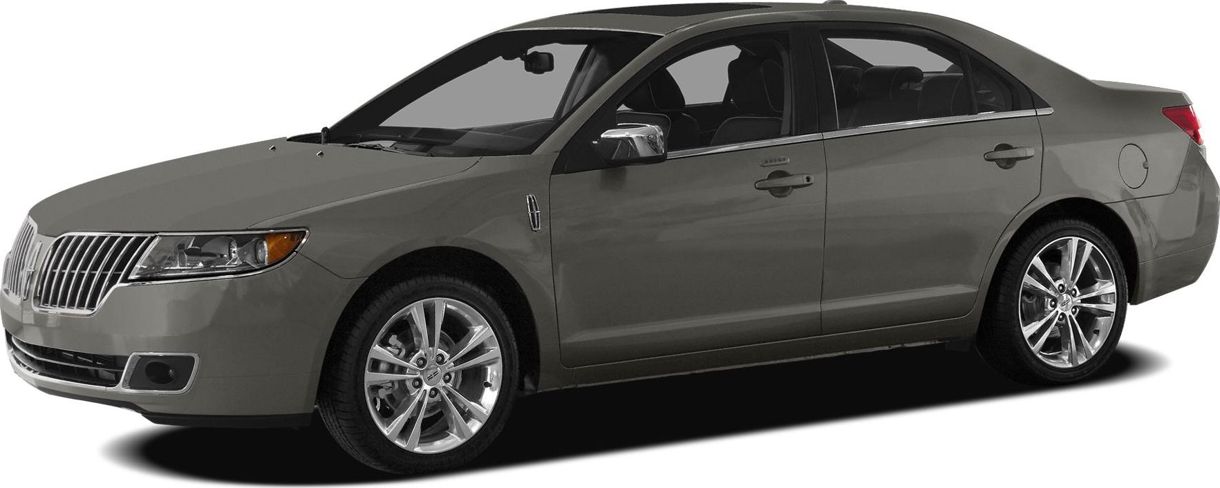 Front side view of sedan with chrome grille and polished alloy wheels