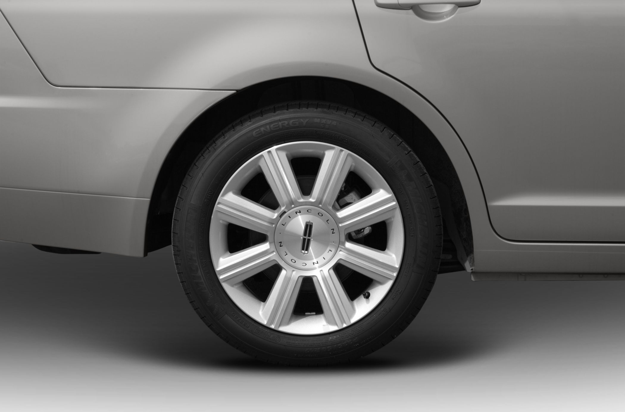 Close-up of alloy wheel and rear quarter panel