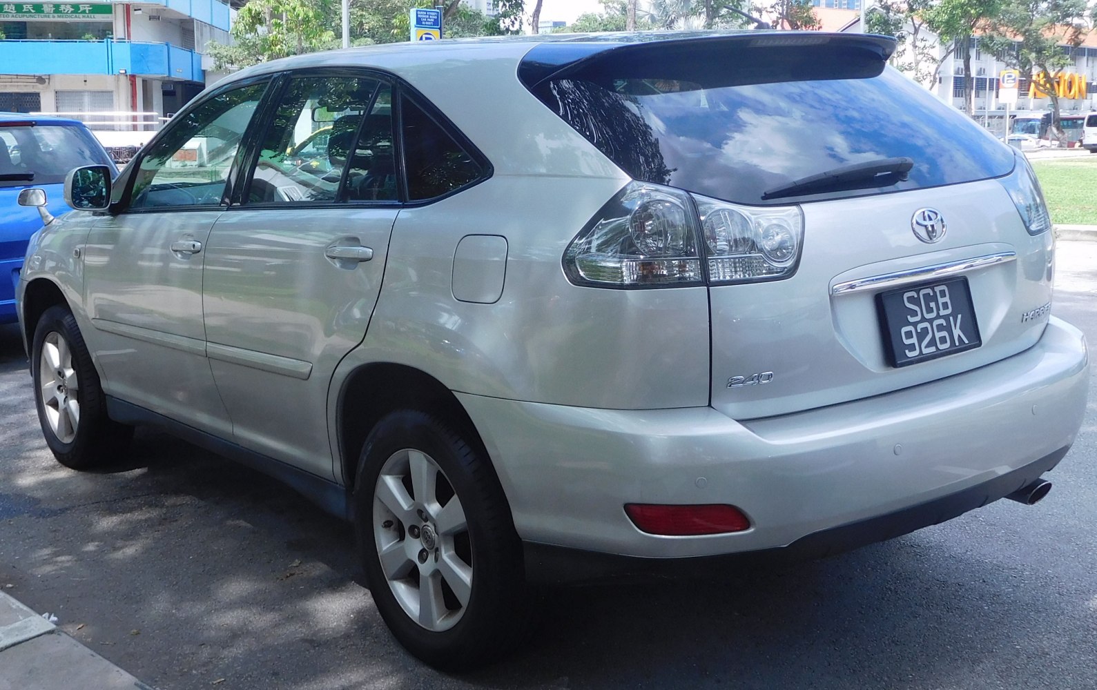 Silver SUV rear and side view with alloy wheels and clear taillights