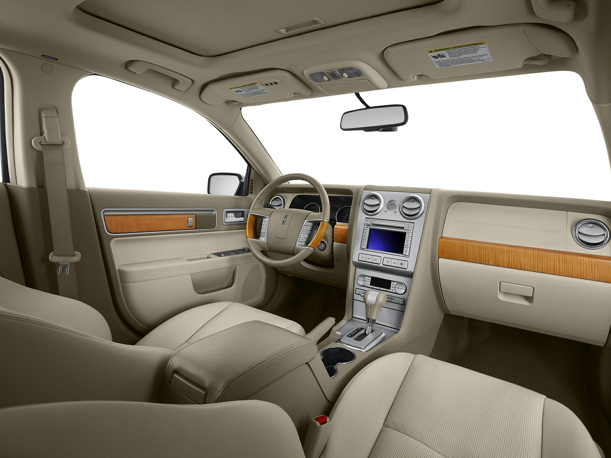 Beige leather interior with wood trim and central console screen