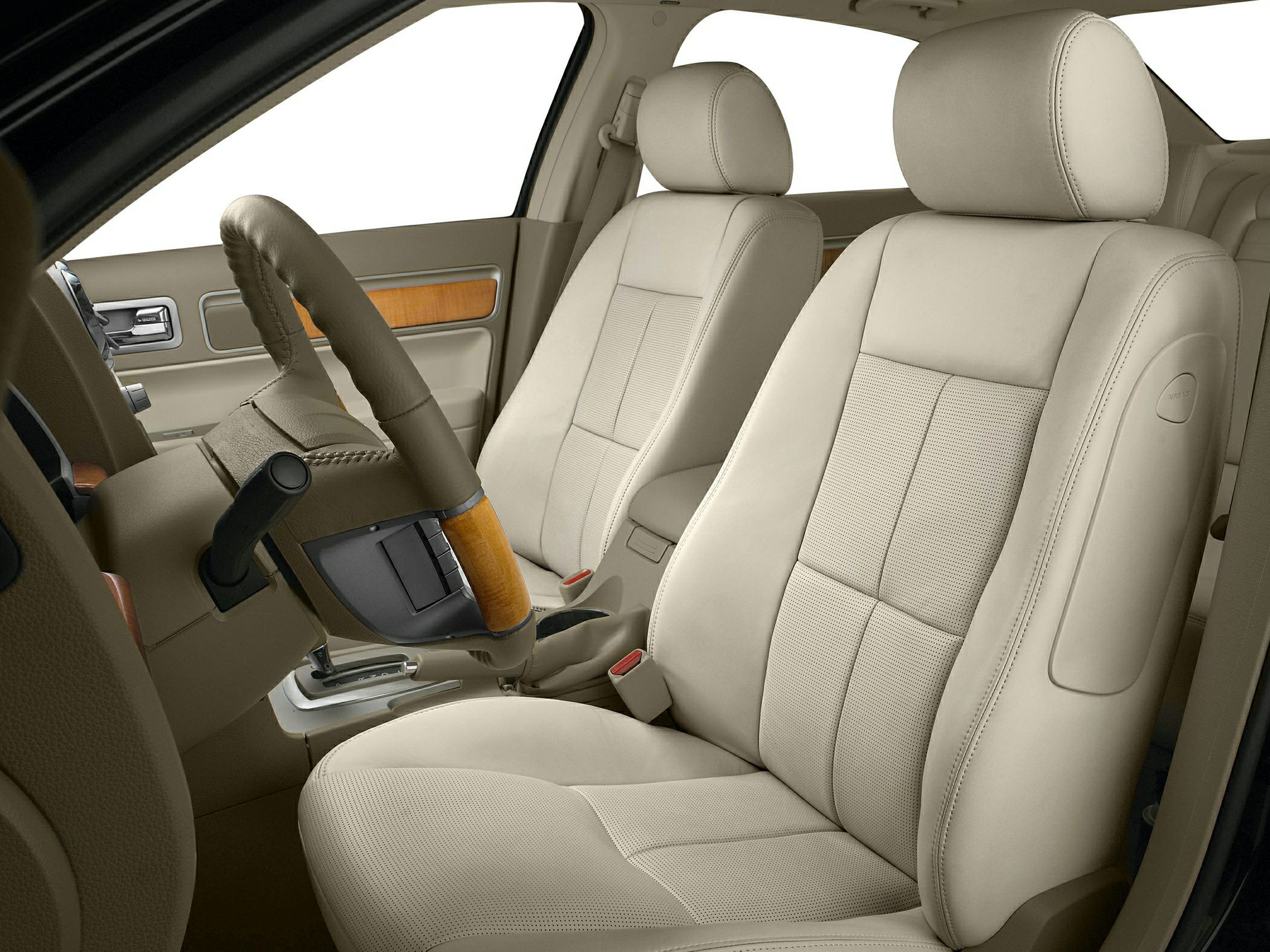 Beige leather seats with wooden steering wheel accents