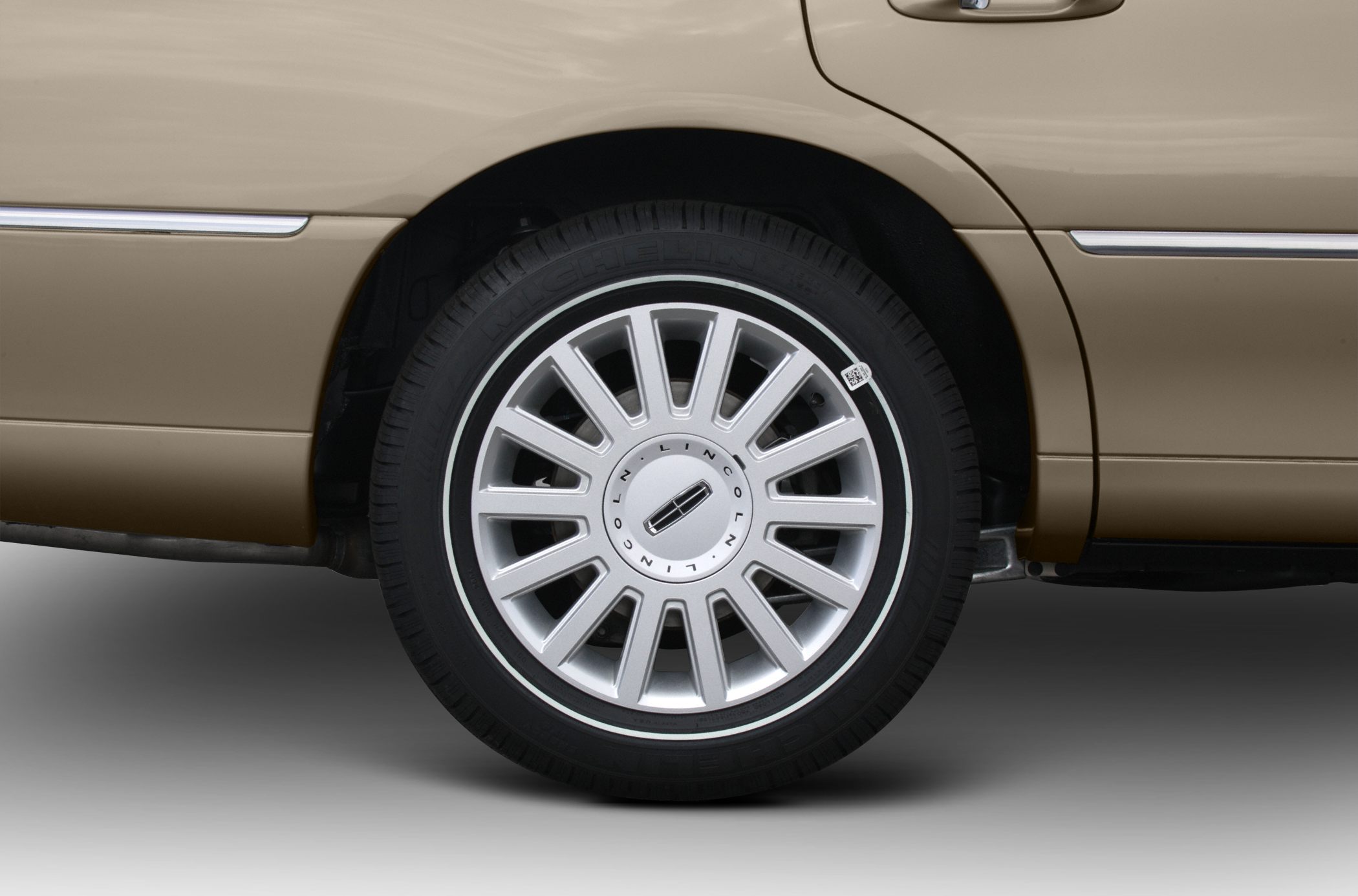Multi-spoke alloy wheel with visible tire tread and sidewall