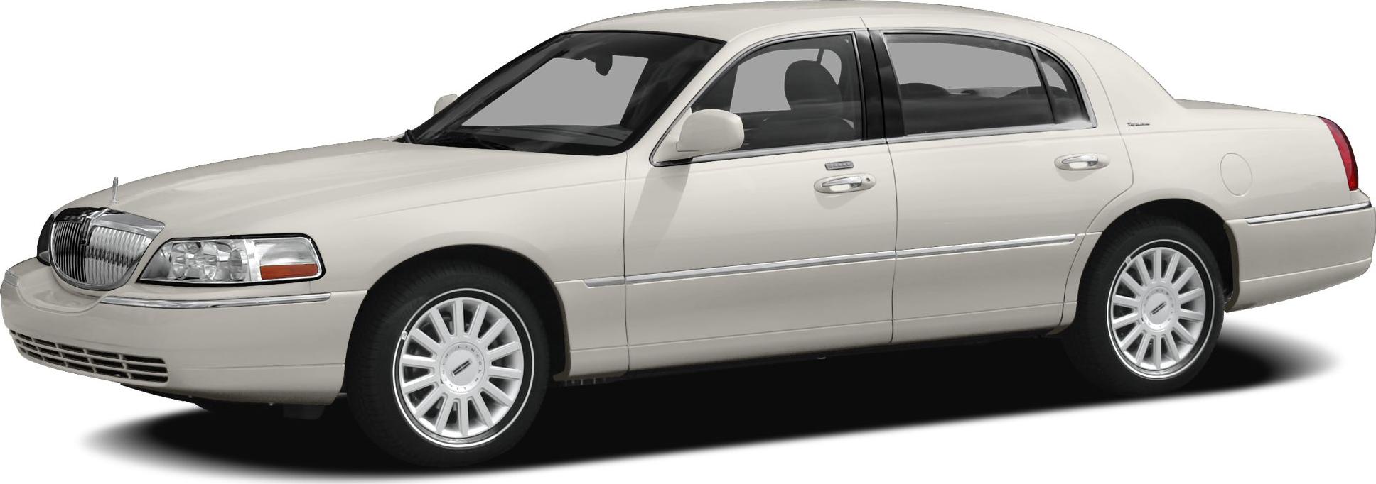 Classic luxury sedan side profile with chrome grille and alloy wheels