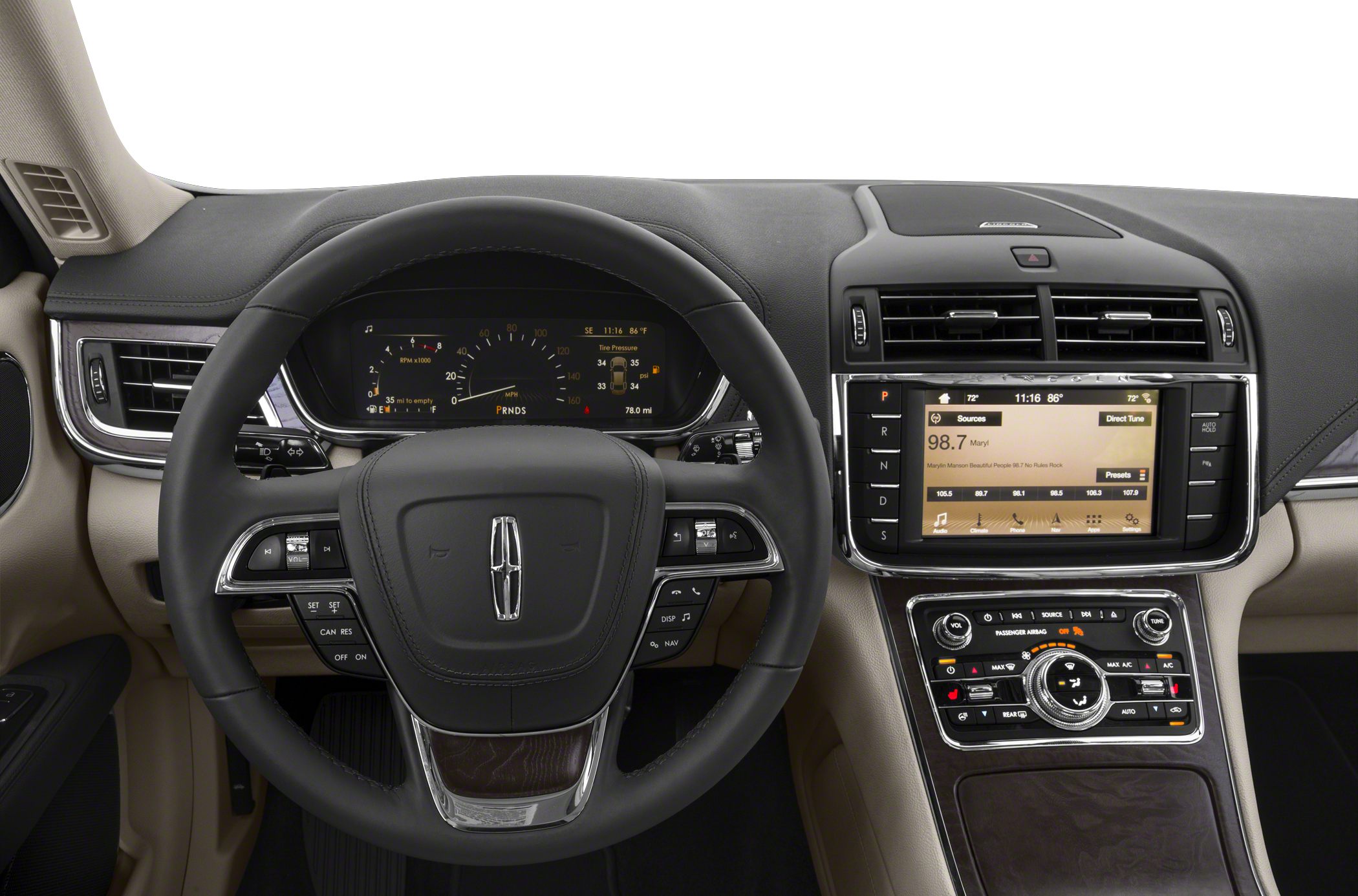 Digital instrument cluster and touchscreen infotainment system with steering wheel controls.