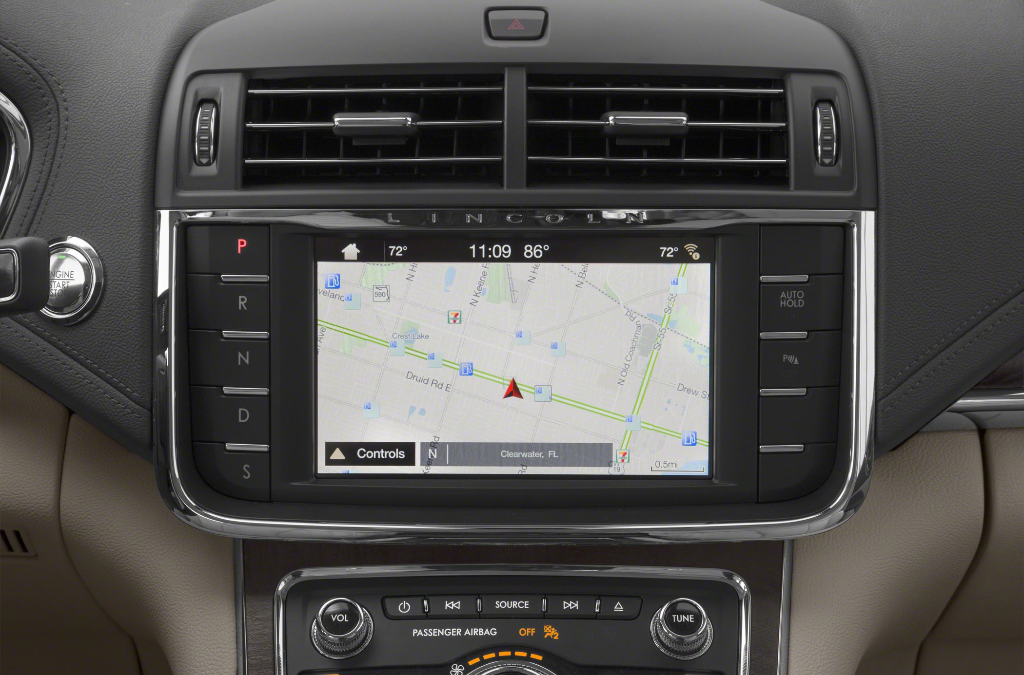 Touchscreen navigation and push-button gear selector in car center console