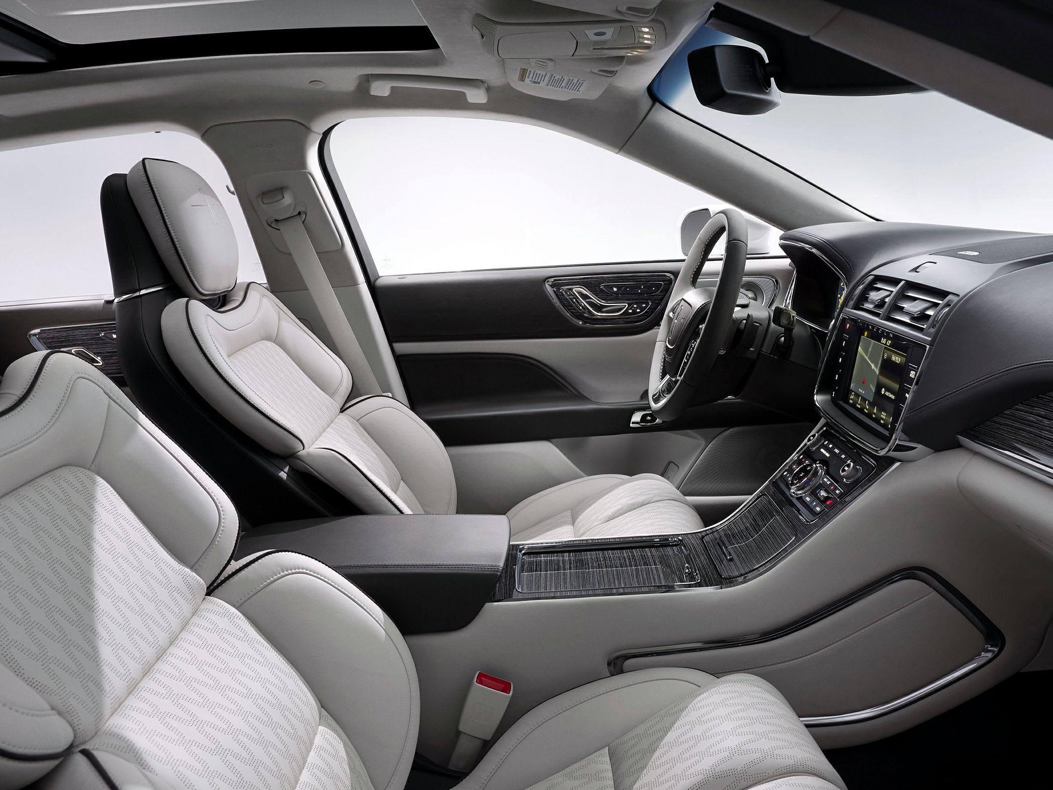 Luxury interior with leather seats, panoramic sunroof, touchscreen console