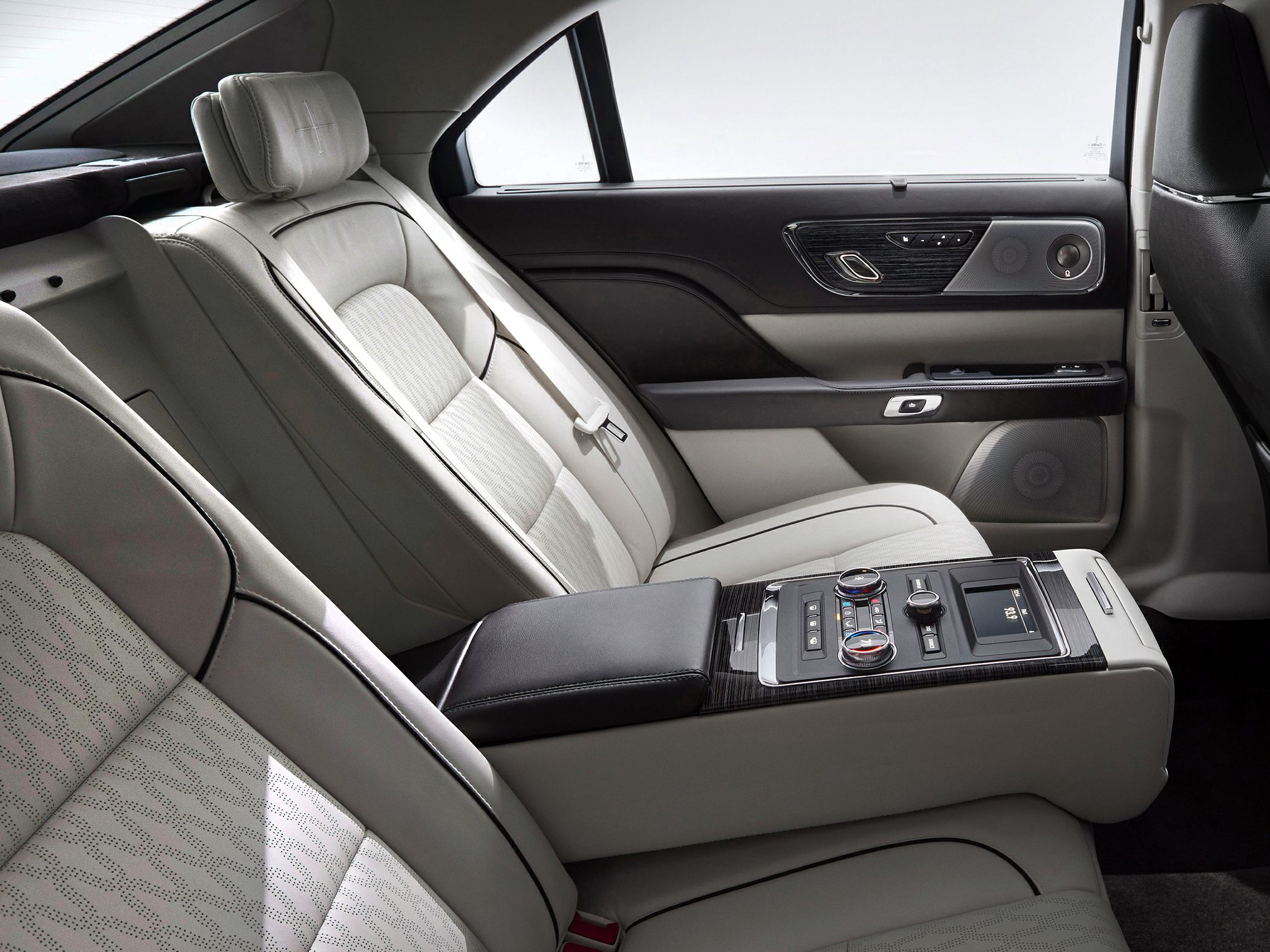 Luxury rear seat and advanced control panel in premium car interior